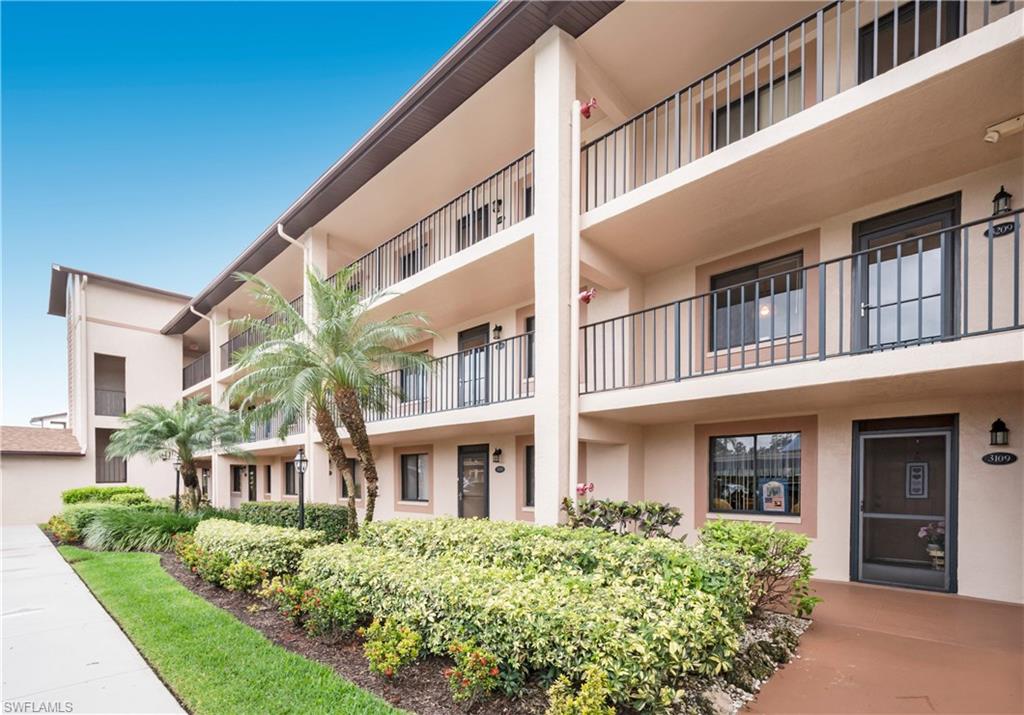 Enjoy the morning sunrise over the golf course and lake from the lanai of this second floor 2 bed 2 bath condominium. Countryside Country Club Community offers an 18 hole golf course, putting green, driving range, state of the art fitness center, bocce, 4 har-tru tennis courts, pickleball, restaurant and lounge.  The unit includes a social membership, owner may play golf with call ahead just pay green fees. Located within minutes to downtown Naples and the beautiful beaches. Don't miss this one!