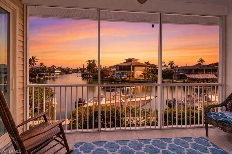 NEW DOCK, NEW LIFT IN THIS DIRECT GULF ACCESS 4-bedroom, 2-bathroom waterfront home. A true boater’s paradise dream with direct access to 10,000 islands, known for top backwater and offshore fishing. This spacious home boasts expansive water views and an open-concept living area filled with natural light, ideal for entertaining or simply enjoying the tranquil surroundings. Recent upgrades include impact-rated windows, doors, a new roof, and a new garage door. Large screened lanai offering the perfect spot to enjoy the beautiful bay views. With a gigantic oversized garage, plenty of storage, and ample space for your boats, trailers, or golf carts, this home combines a beach vibe and convenience. Located just minutes from popular local spots like Stan’s and Little Bar, and only a short drive to Marco Island’s beaches and shopping, this is the ultimate waterfront retreat. Don’t miss your chance to own this exceptional property in one of the area’s most desirable location!