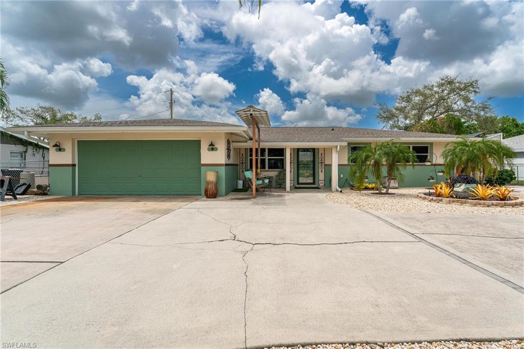 This move-in ready property boasts 3 bedrooms, 2 bathrooms, secluded pool and recently installed $40k in solar panels. Who doesn't want a $25 light bill? This fantastic home has a spacious split floor plan, plank tile floors, LED lights, new duct work, new washer & dryer, new hot water heater and much more, in the desirable neighborhood of Waterway Estates in North Fort Myers. The fenced-in backyard is ideal for a nature/gardener lover. There is also a 8x10 storage shed, expanded circler driveway, and a RV hookup. Additional features include a screened lanai, 2-car garage, and lush landscaping. Get ready to enjoy your slice of paradise. Solar panels are fully paid for!