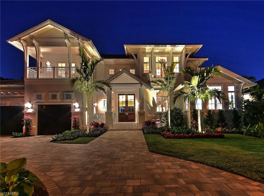 BEING OFFERED FOR THE FIRST TIME TURNKEY FURNISHED. A stunning masterpiece designed home by MHK Architects. This breathtaking West Indies Home is located on an OVERSIZED LOT WEST OF CRAYTON on one of the MOST desirable streets in one of the MOST sought after locations in the MOORINGS! This home features a GREAT ROOM OPEN FLOOR PLAN with 5 Bedrooms and 6 and a half baths. Large Master Bedroom Suite on first floor opening to an inviting outdoor private oasis. The outdoor living space is complete with outdoor kitchen, gas fireplace and custom OVERSIZED Pool with Spa with Sun shelf...PERFECT FOR ENTERTAINING AND FLORIDA LIVING! Come see this relaxing spacious retreat that is professionally designed with excellent taste and exceptional quality and custom designer details for a luxurious yet comfortable lifestyle...Located a few blocks from the MOORINGS PRIVATE BEACH PARK and a short distance to 5th Avenue, 3rd street, Waterside, Mercato and ALL that Naples has to offer. NO detail has been overlooked and the finest materials have been used to create these impeccable interior and exterior finishes.