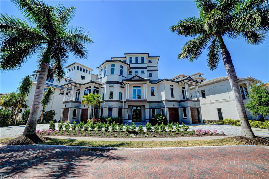 This new 2017 direct gulf front home offers an uncompromising level of luxury and sophistication. Not the typical transitional styled product, this home offers a fresh new coastal modern pallet.  Home offers enormous spaces, 6,314 ac/sq ft and 11,665 total sq ft that includes a 5+Den floorplan. Head up the grand stair case into the main level with 12’ ceilings that offer staggering gulf views. The kitchen is spectacular with two generous sized marble top islands, high end appliances and cabinetry. The dining room is large and a show piece. Living room offers a tasteful sophistication with smooth lines and strategic lighting. Top floor master level offers his and her wings and bedroom size closets. The master suite has centered views and oversized outdoor living space. Master bath is gulf front with beautiful flooring, free standing tub, and shower with marble surrounds. The guest level offers top tier suites with a gathering den and bar. Four separate garage doors leading to oversized garage areas. Beautiful landscaped beach garden with oversized swimming pool including lap lanes, fitness room, tennis courts and full slate of recreational activities.