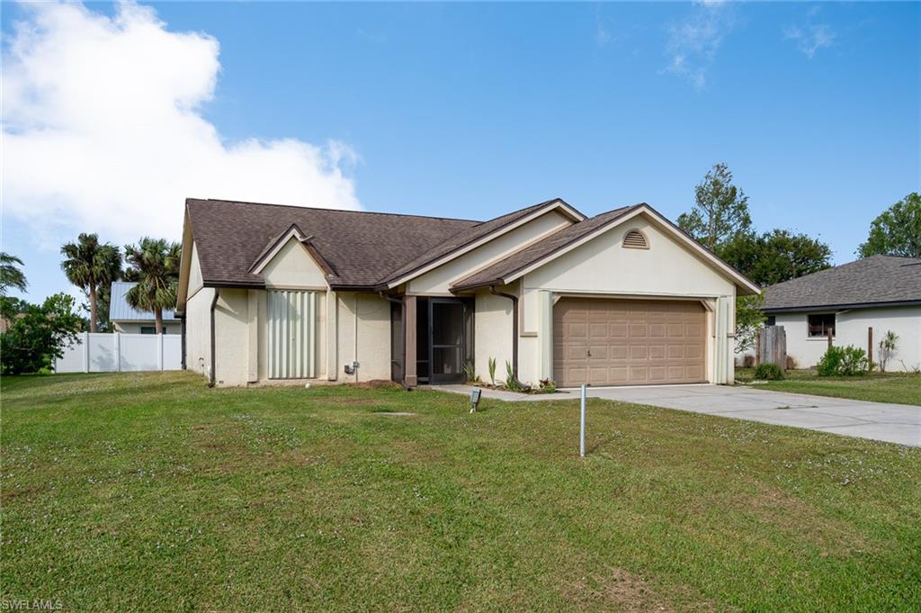 Make this single family home concrete block home has NO HOA fees your new home. Open Floor plan, Pocket sliding glass doors open the house up to a large screened in lanai, enclosed garage to make third bedroom. Some small exterior flashing repairs needed but otherwise no leaks from the storm. Appliances, washer and dryers remains. Master bedroom with master bath and Master closet enclosed. Seller is aware home needs flooring and other updating in the kitchen/other areas, but the listing price is taking this into consideration. AS IS, no FHA or VA financing per seller