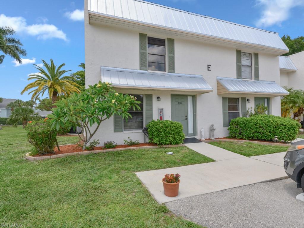 One or more photo(s) has been virtually staged, AI generated or rendered.  Welcome to this rarely available, exceptional end-unit condo that perfectly balances comfort and convenience in beautiful Palm River. This thoughtfully designed three-bedroom, two-and-a-half bathroom townhouse residence is the largest property in the community and would be perfectly suitable for a seasonal, full-time or rental property. The freshly painted interior creates a bright, welcoming atmosphere throughout both levels. The first floor features a versatile den that doubles as a third bedroom, perfect for guests or a home office, along with a convenient half bath. Upstairs, you'll discover two comfortable bedrooms serviced by two full bathrooms, providing privacy and functionality for daily living. Recent upgrades include new plumbing throughout the home, newer A/C, and water heater ensuring peace of mind for years to come. The end-unit positioning floods the space with natural light from multiple directions, creating an airy feel that's hard to find in typical condos. Step outside to your private landscaped views that provide tranquil backyard scenery. This outdoor space offers the perfect retreat for morning coffee or evening relaxation away from the hustle and bustle. Convenience extends beyond the home with one assigned parking spot directly in front of the property. The location provides easy access to quality schools, shopping, and many dining establishments are a matter of minutes away. Veterans Community Park offers recreational opportunities, and public transportation connections make getting around effortless. This move-in ready home combines modern updates with comfortable living spaces just minutes from the sugar sand beaches this area is known for.