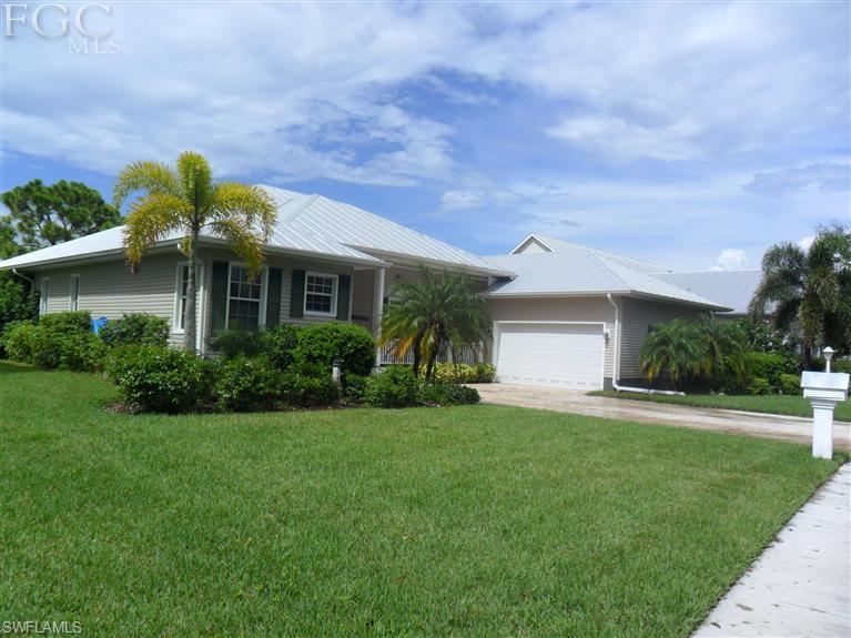 IN GOLFING & BOATING COMMUNITY THIS 4 BEDROOMS  THREE BATH  CUSTOM DESIGNED OLD FLORIDA STYLE HOME LUXURIOUSLY FINISHED WITH GRAND & SPACIOUS FLOOR PLAN. LOCATED ON SECOND GREEN ON Golf Course.  THIS HOME WILL CONVEY W/ TOP OF THE RANGE APPLIANCES, QUALITY FLOORING, GRANITE COUNTERTOPS, CABINETRY. ELEGANT FRENCH DOORS ALLOW ENTRY W/ VERY SPACIOUS TILED LIVING W/ DINING AND SEPERATE FORMAL DINING AREA. THE INTERIOR HAS SOARING COLUMNS & CURVED HIGH ARCHES CONVEY GRANDEUR & SPACIOUSNESS. THERE IS A PARTY SIZE LANAI OVERLOOKING LUSCIOUS GREENS AND VERDENT MATURE SHRUBBERY. MASTER BEDROOM IS SPACIOUS WITH HIGH CELINGS AND OPENS ONTO REAR LANAI, THERE IS A DELUXE ONSUITE WITH SEPARATE TUB/SHOWER AND VANITY UNITS,  THIS AREA HAS DOUBLE HIGH CELING, CLOSETS, AND ADDITIONAL LINEN CLOSET SPACE. ALL OTHER GUEST BEDROOMS ARE SPACIOUS. SITUATED IN 212 ACRES OF PARKLAND, OFFERS A NATURAL TRANQUIL SETTING W/NATURAL WALKWAYS, 10MIN 1-75, 25MIN TO AIRPORT, 25 MIN DOWNTOWN. ALL YOURS FOR A GREAT PRICE.