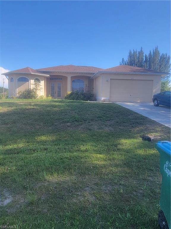 Large, spacious, 4 bedroom family home awaits your personal touch. Hidden jewel in quiet NW Cape Coral. Lot next door also available for sale to make this home more private or larger. Plenty of room for a pool in backyard where there is already a half bath on back lanai perfect for pool bath. So large that there is even room for a pool table without loosing any space from dining room and eat in kitchen and breakfast bar, as seen in picture, can also be negotiable with good offer. AC replaced in 2017, complete xfinity home alarm system, newly screened lanai, reverse osmosis water filtration system, new well pump, water heater replaced in 2018, roof original but NEVER HAD A LEAK OR ISSUE! Ceiling fans through out whole house. DIAMOND IN THE ROUGH! PERFECT FOR VACATION RENTAL BY OWNER AFTER A REMODEL,. OR INVESTOR FLIP. Sun Splash Family Water Park close by. NEIGHBORHOOD KEEPS GOING UP IN VALUE! WONT LAST LONG!