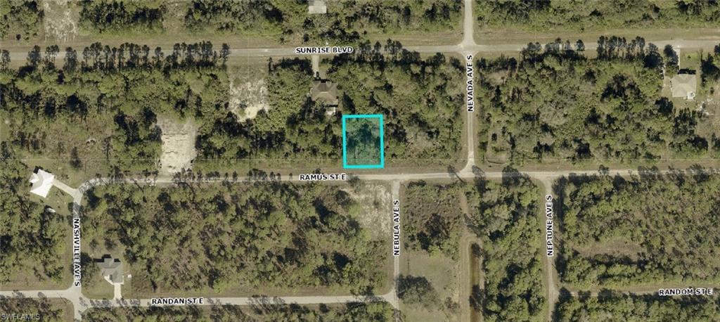Great buildable vacant lot in Southeast Lehigh Acres with paved roads and power at the street! Ideally located just off Sunrise Blvd & Columbus Blvd with quick access to State Road 82 for an easy commute. Surrounded by new construction in a rapidly growing area, this lot is perfect for your future pool home or investment property. Buy now and build later with low taxes and no required timeline to build. NOT an assignment of contract. LOCAL sellers with quick answers and smooth closings! NO ASSIGNMENT CONTRACTS ACCEPTED
