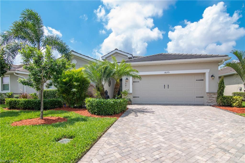 This versatile Trevi offers 2,032 square feet of living space featuring 4 bedrooms in a desirable split floor plan with 3 full baths, 2-car attached garage, situated on a premium 40-acre lake lot with an outstanding SW exposure! Boasting ceramic tiles tile set on the diagonal throughout the main living areas, carpeted bedrooms, granite counters in kitchen and all baths, wooden cabinets, custom cabinets in laundry room for additional storage & custom heated salt-water pool/spa, multi-color LED lighting with extended screen enclosure. The primary suite provides a private retreat with a walk-in closet featuring custom cabinets and a large bathroom with both a walk-in shower and a soaking tub. The spacious kitchen featuring stainless steel appliances is open to the family and dining rooms, providing the ideal flow for entertaining and living. The covered lanai is ideal for enjoying the Florida lifestyle and the spectacular sunsets. Bonita Landing is an enclave of 219 homes creating an intimate atmosphere with manicured landscaping, 40-acre lake conveniently located to local dining, shopping & Gulf beaches that Bonita Springs has to offer. Furnishing are negotiable.