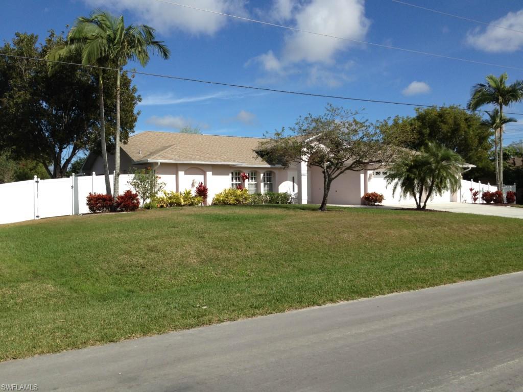 Guaranteed to Please, This Immaculate 4 Bed, 2 Bath Pool Home is a Must See! HUGE PRICE REDUCTION! Sellers are Motivated! Built in 2000 and Meticulously Maintained, this 2154 Sq.Ft. Home Has The Features And Upgrades You're Going To Love! From The French Doored Entryway to the private Fenced Backyard There Are No disappointments Here. All On A 3 Lot Site with a 3 Car Garage! This Fine Home Has Many Outstanding Features Including 18 inch Tile Flooring in most Common Areas, Wood Flooring in Living Room & Dining Room, Newer Carpet in Bedrooms, Walk In Closets in 3 of the Bedrooms, Granite Countertops in Kitchen, Baths & lanai, Six Panel Doors Throughout, Newer AC System, Newer Appliances, New Window Treatments Through Out The Home Are Sure To Please Even The Fussiest Buyer. Outside, The Large Lanai with Pocket Sliders & French Doors, 28' x 14' pool recently refinished in 2013, Hot Tub, Lighted Backyard with 6' Privacy Fence, Lush Landscaping with Auto Sprinkler System Complete this Fine Home. Hurry on This One! Agents please see confidential comments for showings.