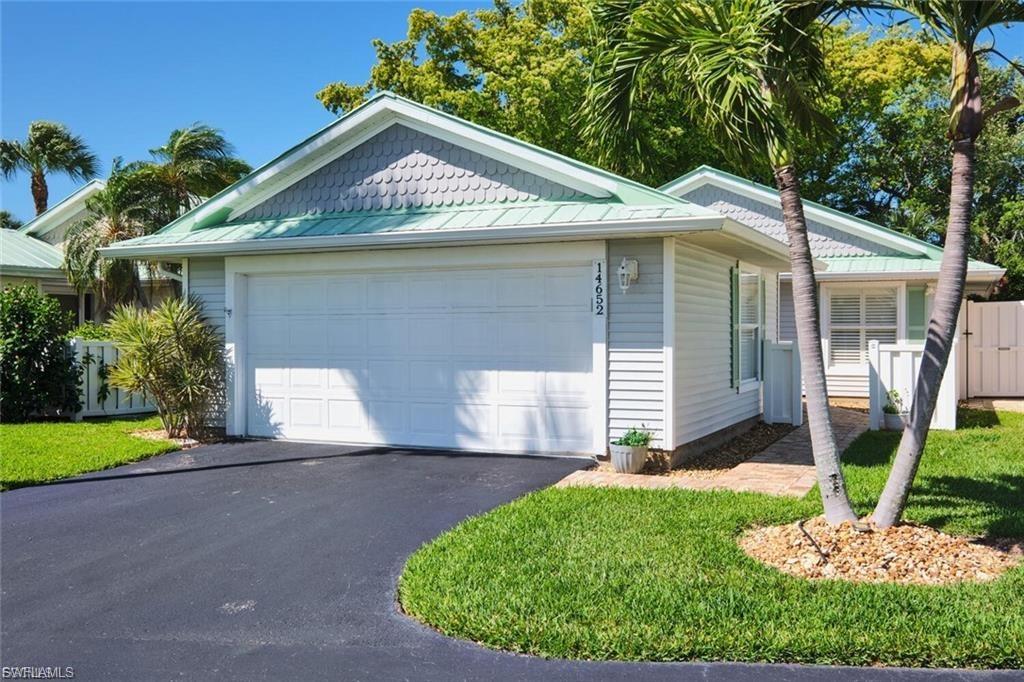 Enjoy the Florida lifestyle in this charming 3-bedroom, 2-bath home with a 2-car garage.  Conveniently pull right into your own private residence!   This detached villa home features tile flooring throughout and beautifully renovated bathrooms.  Relax on the screened lanai surrounded by mature trees and lush landscaping, or catch some rays while relaxing at the community pool located just steps away!