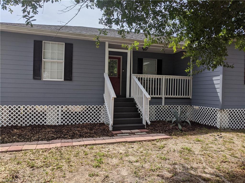 Adorable is the word for this home! This home is located in a quiet neighborhood with easy access to shopping, restaurants, entertainment and schools! The front porch is inviting you to sit and rock while you drink your morning coffee. If outside entertaining is what you love, there is an open deck on the back of the home for your grill, fire pit and room for your guests to enjoy the fantastic Florida weather. Inside you will find an open concept living, dining and kitchen. The appliances were updated in 2019. The bedrooms are spacious. The owner has taken great care of this home. A new roof, new water system, well pump and water heater were installed in 2018. The septic system was pumped and serviced in 2021. This home comes with a ring doorbell and security system. Don't wait to see this home. It will be gone in a flash!
