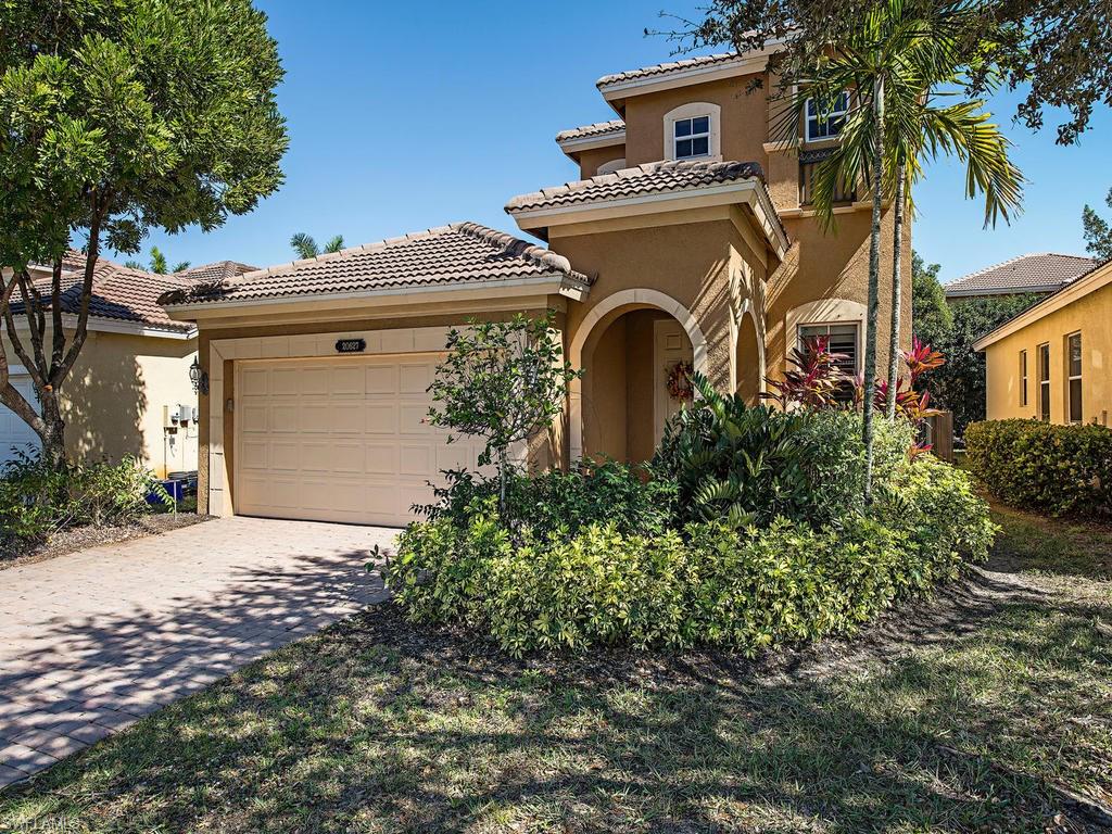 Best Deal in Copper Oaks! 2.5 Bath 3 BR Bayleaf floor plan with pool!  Downstairs features diagonal tiled flooring, volume ceilings, a ground floor master with spacious walk in closet, and wood flooring - master bath features jetted garden tub and dual sinks.  Kitchen features granite countertops, breakfast bar, pantry, and 42-inch Maple cabinets.  Formal living and dining, family room, and half bath complete the main floor living area with a heated pool, brick-paver deck and vaulted screened Lanai just off the family room.  Upstairs has two bedrooms with Jack & Jill bathroom and small loft.  Features: manual storm shutters, alarm, and tile roof, new AC in 2014, new water heater 2016.  Low HOA Fees with great amenities.  Gated community with sidewalks, Community pools and Spa, Exercise Room, Basketball Courts and play area.  Close to shopping and dining at Coconut Point and Town Center Malls, FGCU, and the airport.