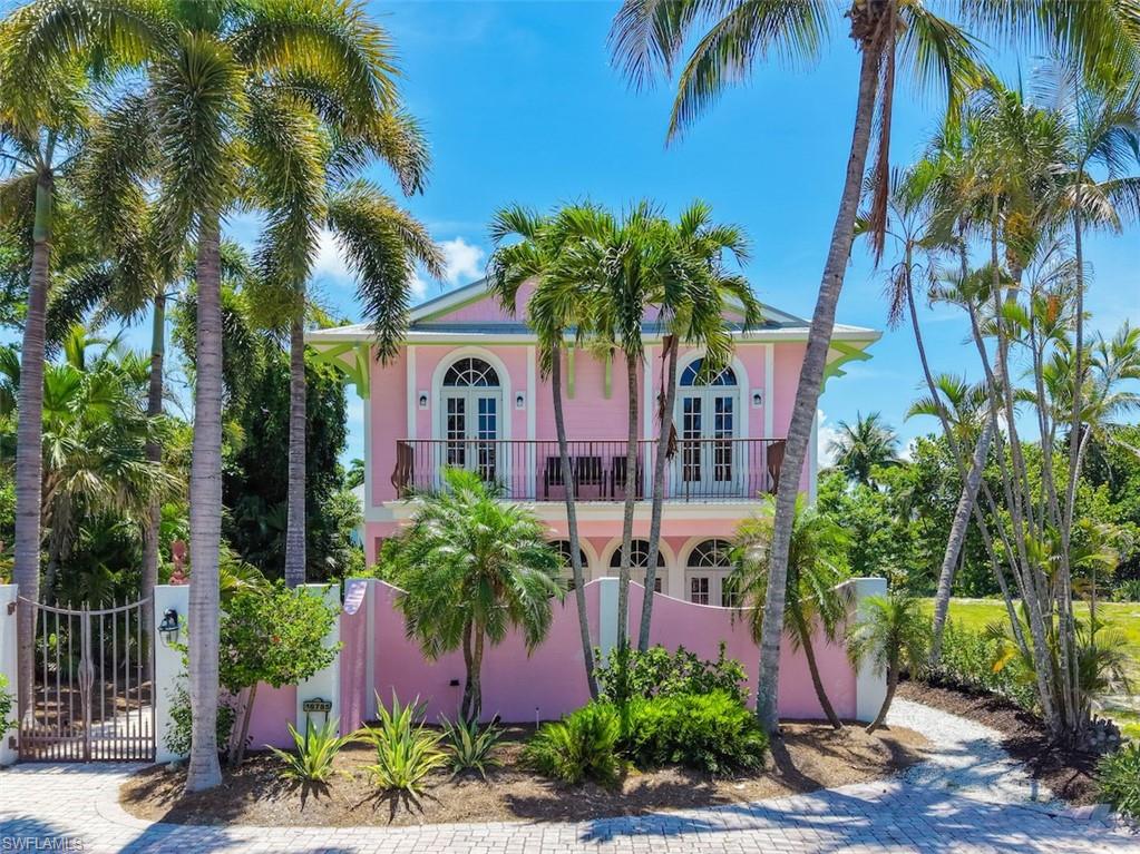 Welcome to your private island retreat on Captiva Island, where tropical elegance, direct boating access, and beachside livingcome together in one extraordinary property. Nestled amid lush native landscaping and swaying palms, this waterfront home offers the rarecombination of private dockage, direct boating access to the Gulf waters and surrounding islands, and beach access with parking just stepsaway at Blind Pass. Designed to embrace the beauty of its island surroundings, the residence exudes timeless coastal charm with bright,light-filled interiors, soaring ceilings, arched windows and doors, and seamless indoor-outdoor living. Outside, a resort-style pool issurrounded by mature tropical gardens, creating a peaceful sanctuary for relaxation and entertaining. A private dock tucked along the naturalshoreline provides a serene setting for launching a boat, kayak, or paddleboard. From the private dock, enjoy direct boating access viaRoosevelt Channel to Pine Island Sound, the Gulf of Mexico, North Captiva, Cayo Costa, and world-class fishing, shelling, cruising, andwaterfront dining destinations throughout Southwest Florida. Whether setting out for a day on the water or exploring nearby islands, thisexceptional location offers the very best of the island boating lifestyle. Thoughtfully designed with four spacious bedrooms and multiple deckspaces on either side of the home, the residence offers inviting places to relax and take in the tropical surroundings. Wonderfully appointedwith an eclectic island vibe, it perfectly captures the laid-back elegance that defines Captiva living. The residence has also enjoyed a stronghistory as a successful vacation rental, offering owners the ability to offset carrying costs while preserving flexibility for personal use.Whether you're enjoying sunrise walks along Captiva's pristine beaches, afternoons on the water, or evenings by the pool beneath the palms,this exceptional property captures the essence of island living. Private, tranquil, and surrounded by nature, it is a rare opportunity to own atrue Captiva Island retreat where boating, beach, and investment potential meet.