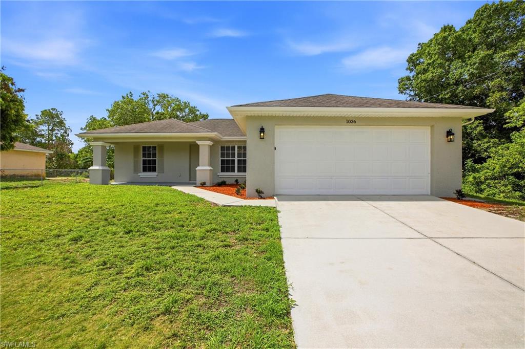 FISH FROM YOUR BACKYARD!  Come enjoy this this updated 3-bedroom, 2-bath home - where you you can fish and watch the wildlife from your own backyard.  The freshly painted home pairs inviting Florida living with thoughtful updates, including a 2022 hot water heater.  From the moment you arrive, the long covered front porch welcomes you in with refreshed landscaping, updated mulch beds, and curb appeal that feels warm and well cared for — the perfect spot to enjoy morning coffee or unwind after a long day. Inside, vaulted ceilings and an open great room create an airy feel, while triple sliding glass doors draw your attention straight to the backyard and canal beyond. Tile flooring throughout the main living areas keeps the home stylish and easy to maintain, and the decorative niche shelves add character reminiscent of classic Southwest Florida design. The kitchen was designed with gathering in mind, featuring a large center island, granite countertops, white cabinetry, pantry storage, upgraded faucet, and stainless steel appliances including the dishwasher, range, and microwave. The dining area enjoys views of the front garden, bringing in natural light and a peaceful setting for meals, coffee chats, or hosting friends. The split-bedroom floor plan offers privacy, with two guest bedrooms and a well-appointed hall bath tucked away from the primary suite. Overlooking the backyard, the spacious primary bedroom features a huge walk-in closet and private ensuite bath with granite counters, white cabinetry, linen storage, and a tub/shower combination. Out back, the screened lanai extends your living space outdoors, creating an ideal setting for entertaining, grilling, gardening, or enjoying quiet Florida evenings by the water. Additional features include hurricane window panels, a hurricane-reinforced door, and an X flood zone location.