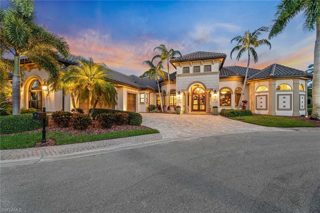 Experience the pinnacle of luxury living in this magnificent estate home located in the prestigious, gated community of the Estates of Harbour Preserve in Cape Harbour. With just under 5,000 square feet of exquisitely designed living space, this 4-bedroom, 4.5-bathroom masterpiece offers a seamless blend of elegance and modern convenience.

Key Features:

Grand Living Spaces: High-end finishes throughout, including soaring coffered ceilings and 90-degree vanishing sliding doors that create a breathtaking indoor-outdoor living experience.
Chef's Kitchen: A gourmet kitchen equipped with a 48" gas stove, upscale refrigerator, custom cabinetry, and stunning countertops—perfect for both casual dining and entertaining.
Guest Suites: Three en suite guest bedrooms, each with their own private bath, providing comfort and privacy for visitors.
Second-Floor Retreat: A spacious game room, bar, additional bedroom with bath, and a large screened balcony overlooking the luxurious pool area and waterfront.
Outdoor Paradise: Step outside to the resort-style pool area, featuring a spa, privacy wall, and newly updated paved lanai as well as an outdoor kitchen and bar. The home's landscaping has also been beautifully refreshed to enhance its curb appeal as well as newly installed paver driveway.
Waterfront Living: Enjoy direct access to the water with a composite dock, 24,000 lb boat lift, and 129 feet of waterfrontage—ideal for boating enthusiasts.
Upgraded Features: New roof, new impact windows and doors, full-house gas generator, and updated exterior and interior paint complete this impressive home, ensuring it is move-in ready.
This home truly represents the best of Southwest Florida's waterfront lifestyle with luxury finishes and resort-style amenities throughout. Schedule your private showing today to experience this one-of-a-kind property.