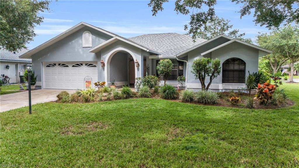 NEW LISTING JUST REDUCED PRICE!!! Welcome to this charming home in the desirable Three Oaks in the Cypress Chase community! This beautifully maintained 3-bedroom, 2-bath residence features a 2-car garage, a dining room, and a Kitchen that opens up to the family room. The Kitchen and living room boast vaulted ceilings, adding an airy and spacious feel. The master bath is a true retreat with a spa tub, a shower, and a walk-in "organizer" closet. Relax and unwind on the oversized  lanai with stunning lake views, perfect for serene mornings or peaceful evenings. Situated on a quiet corner cul-de-sac, the property is surrounded by a oak tree canopy street, offering privacy and tranquility. Enjoy access to the community pool with low community costs, making this an affordable luxury. Conveniently located for commuters, this home is nestled between exits 123 and 128, only 20 min. to Naples, ensuring easy access to all your needs. It's just a short distance to shopping, parks, schools, and churches, 5 min or less to FGCU, Publix, Walmart, home depot, Lowes, Coconut Point Mall, and Town Center Mall providing a perfect balance of seclusion and convenience. This home comes with several newer upgrades, including a dishwasher, hot water heater, upgrades in the guest wing to include flooring, paint, vanity, roof (2024), and exterior paint (2024). The kitchen is equipped with a glass top stove and a venting microwave, and the family room features a wet bar, ideal for entertaining. Speaking of entertaining, two cars fit in the garage and four more will fit in the driveway. Don't miss the opportunity to make this private and convenient home yours!