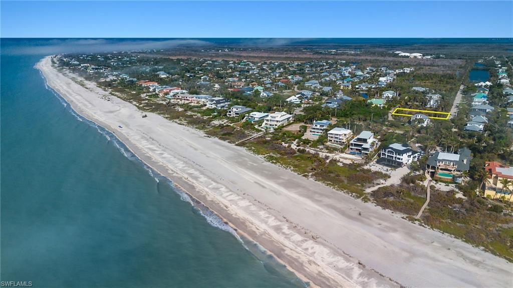 This is the island opportunity you have been waiting for - an incredible single-family buildable homesite on West Gulf Drive with private driveway access off Sawgrass Place. In this low-density subdivision with beautiful island-style homes awaits a cleared lot (.38 of an acre) with electricity, sewer, and water already in place.  In addition, there is deeded beach access directly across the street to Sanibel's world-famous beaches.  Home plans are available upon request.  Enjoy some of the best shelling in the world, or take a bike ride to one of the many island attractions from this desirable location.  This lot will allow you to build the home of your dreams on the West end of Sanibel and take advantage of everything the island offers!