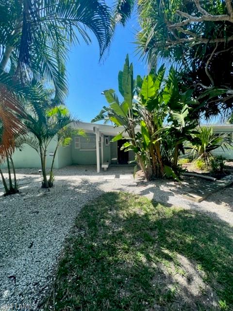 One of the most unique properties in Cape Coral with fantastic water access. Enjoy this quaint Key West historical home that has been completely remodeled with over 3200 sq ft of living. Four bedrooms, 3 bathrooms, open floor plan and many upgrades.  Just minutes to open water.  With over 180 feet of seawall, this is a boaters dream.  Or build the Home of your Dreams here.  Have you ever seen the Aubuchon home named the Carleton? Even that 3600 sq foot award winning home with over 4 car garage would fit on this enormous lot.  Don't miss this rare opportunity.