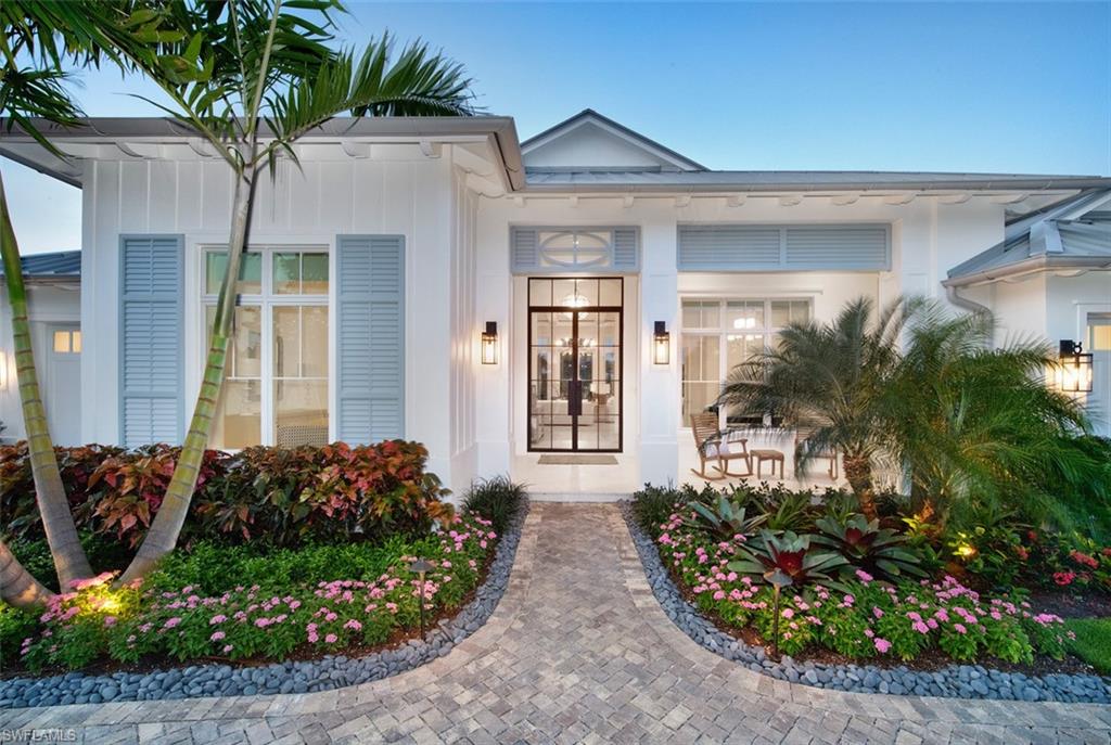 Indulge in the epitome of coastal living at this award-winning Naples retreat, boasting the prestigious 2022 Sand Dollar Award. Experience seamless indoor-outdoor transitions with sliding pocket doors leading to the open-air lanai—a dream setting for entertaining.

Bathed in natural light, this home features high windows and ceilings throughout, accentuating its airy allure. Exceptional millwork and wide plank oak floors complement the elegant Ruffino cabinets, creating a timeless aesthetic.

Designed by Stofft Cooney and built by Van Emmerik Custom Homes, this residence offers a chef's kitchen equipped with Subzero refrigerators, a Wolf Steam Oven, and a Bertazonni stove/oven. Five bedrooms plus an office provide ample space, while the two-car garage and a climate-controlled single garage offer versatility. 

Outside, enjoy the 46-foot saltwater pool and spa amidst landscaped grounds. Situated at the end of a quiet cul-de-sac in Pelican Bay, amenities include private beach clubs, tennis, pickleball and proximity to Waterside Shops and Artis-Naples.

Live the lifestyle you've always dreamed of—schedule your private tour today.