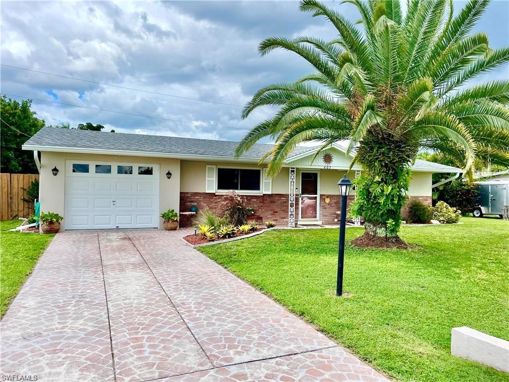 Updated, 2-bedroom 2 full bath on a nice large, fenced lot on a quiet, low traffic street. Updated Mechanicals and appliances, tile throughout property. Covered Lanai with extended pavers for outdoor space, fire pit and Hot tub. 
Attached 1 car Garage. City Water and Sewer. Concrete Block solid home. Central air. Easy Access to Grocery, Schools, restaurants. Reach out for a showing today!
