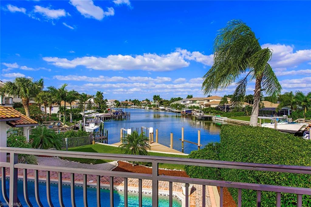 Fantastic waterfront location! Situated on Park Shore's premier street, and offering long water views this well cared for residence will provide years of enjoyment, or a temporary place to create the next generation dream home.