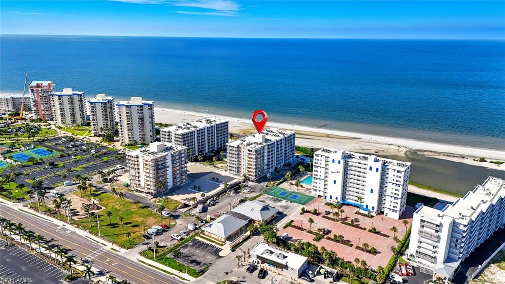 The transformation is complete, and the results speak for themselves. What was once a community undergoing significant improvements has emerged as one of Fort Myers Beach's most refreshed coastal communities, featuring beautifully updated grounds, elevated amenities, and a level of pride of ownership that's immediately evident from the moment you arrive. With the final phase of community plumbing now nearing completion, buyers have the rare opportunity to enjoy the benefits of an extensively revitalized community without paying the premium often associated with new construction.

All buildings have successfully completed mandatory inspections and have been enhanced with hurricane-impact windows and sliders throughout, providing added peace of mind, security, and long-term value.

Perfectly positioned just steps from the sugar-white sands of the Gulf, this turnkey residence offers both Gulf and pool views from an oversized lanai—the ideal setting to enjoy your morning coffee, coastal breezes, or unforgettable Southwest Florida sunsets. Inside, the home is bright, inviting, and move-in ready, offering a seamless transition whether you're searching for a full-time residence, seasonal retreat, or income-producing investment. Tastefully furnished and offered turnkey, you can begin enjoying the Florida lifestyle from day one.

The pet-friendly community offers flexible rental opportunities, making it an attractive option for owners looking to generate income while enjoying personal use throughout the year. Residents enjoy a stunning newly completed pool, beautifully redesigned courtyard spaces, refreshed landscaping, and thoughtfully upgraded gathering areas that create an elevated coastal atmosphere.

This residence also includes one assigned garage parking space and a private storage unit, adding convenience and functionality rarely found in beachfront communities.

Upon arrival, you'll find everything that makes Fort Myers Beach one of Southwest Florida's most beloved destinations. Walk to the beach in minutes, spend your afternoons exploring nearby restaurants, waterfront dining, boutique shopping, and entertainment, or simply soak in the laid-back coastal lifestyle that continues to draw visitors from around the world. As Fort Myers Beach continues its exciting resurgence, this community stands out as one that has already completed the heavy lifting—allowing its next owner to simply move in and enjoy.

The sellers are ready for their next chapter and welcome serious consideration from today's buyers. With a beautifully refreshed community, a turnkey residence, ALL ASSESSMENTS PAID OFF, and an exceptional location just moments from the Gulf, this is an outstanding opportunity to own a piece of Fort Myers Beach at a compelling value. Private showings are encouraged to fully appreciate everything this property—and the community surrounding it—has to offer.
