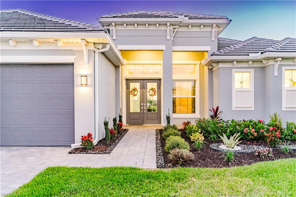 Your chance to own the creme-de-la-creme residence in a PRIVATE GOLF CLUB.  This practically brand new Lakeside home is where thoughtful space design and refined living come together in perfect harmony. Located in the prestigious - exclusive National Golf & Country Club within Ave Maria, Florida. This home has the best location, the best lake view, and the best floor plan of the community. It is a stunning 3-bedroom PLUS den, 3-bath residence, with 3 Car Garage. The chef-inspired kitchen features quartz countertops, modern white cabinetry, and premium finishes that complement the home’s clean, coastal style. The spacious primary suite offers a retreat of its own with abundant closets, full suite bath with large walk-in shower. Two additional bedrooms each with bathroom, one acting as pool bath. Outdoors, unwind on the expansive screened-in lanai with sparkling pool and spa, soak in serene lake views and golden Florida sunsets.
Included exclusive GOLF MEMBERSHIP with privilege to championship golf course designed by Gordon Lewis. Enjoy your bliss selection of amenity, social clubs, or sport. Amenity campus offers pickleball, tennis, bocce, full fitness center, aerobic and yoga studio, and many events. Experience luxurious day spa, resort-style pool, or small private satellite pools. Several venue dining offers both indoor - outdoor dining, to impress at club’s elegant new restaurant and bar. New Conference room and event spaces are available for business or gatherings.
Living in Ave Maria is about becoming part of a vibrant, golf-cart-friendly community filled with charm and connection. With local parks, dining, shopping, and regular community events, it is a lifestyle that is becoming the model for others.