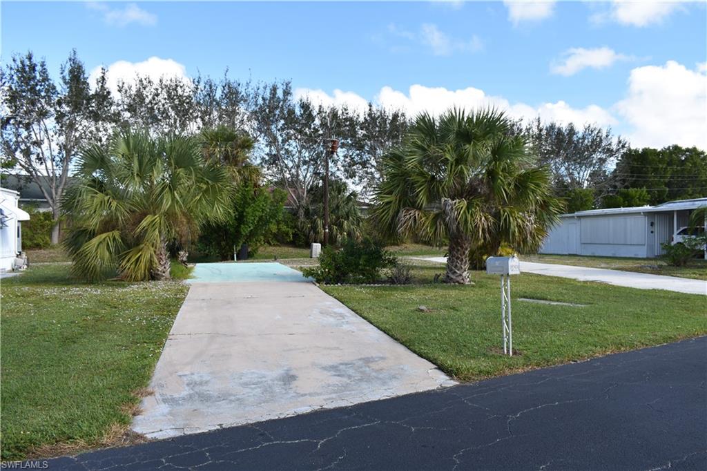 Escape to a tranquil paradise and embrace a simpler life on this expansive property, boasting dimensions of approximately 36 feet in width and 80 feet in depth. All that's missing is your dream home to make it complete! Nestled in the welcoming confines of Holiday Manor, a 55+ Community offering convenient Gulf of Mexico boat launch access, this property provides the perfect canvas for your ideal lifestyle. Conveniently located mere minutes from restaurants, shops, Naples, and Marco Island, this vibrant community ensures you have everything within reach. Enjoy the luxury of a quick fifteen-minute drive to the beach, making relaxation and seaside adventures easily accessible. Holiday Manor offers a range of amenities to enhance your daily life. Take a dip in the heated pool and spa, engage in friendly competition on the shuffleboard courts, or participate in organized events by the active social committee. From dances to card games, billiards, dinners, breakfasts, and more, there's always something exciting happening in this engaging community. Make every day a new opportunity for connection and enjoyment in this delightful 55+ haven.