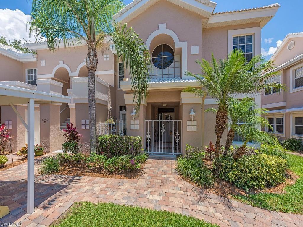 This residence is located West of US 41 in the gated community of Vanderbilt Lakes. One of the largest condos in Bermuda Cays with remodeling throughout. Meticulously maintained second floor end unit. Shows like new, custom oak wood steps lead to the spacious great room. Kitchen has been remodeled with Thomasville cabinets and Silestone countertops. Large dining area open to great room with Cathedral ceiling. Access to over sized L-shaped lanai from 3 areas for enjoying 'outdoor living' at its best and features hurricane rated windows 120-140 mph wind load. Beautiful view from the lanai of the community pool. The home offers an open floor plan with 2 large bedrooms plus a den and 2 full baths. Volume ceilings, plant shelves. The Master Bedroom has "His" and "Hers" closets, a garden tub, walk- in shower and built-in linen closet. Just minutes to two of Southwest Florida’s pristine Gulf Beaches, Airport, Coconut Point Mall and fine dining. Light, bright and private, a MUST see!!