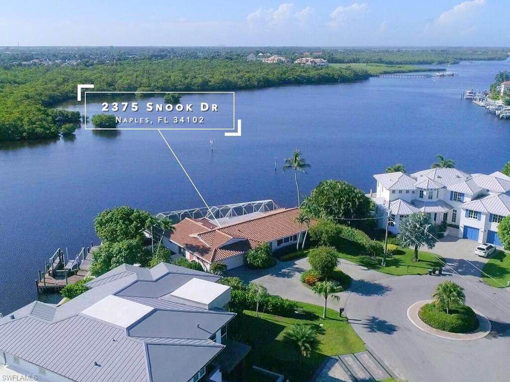 All the beauty of nature cannot describe this magnificent 180-degree water view, with undisturbed panoramic sight of the protected mangroves of Haldeman Creek.  Be in awe with the magic colors of the sky before and after a storm, as the dolphins play in your extended backyard.  Enjoy the sunrise and the offset of the sunset from the sweeping 180 degree view.  This property is a rare find in Royal Harbor located at the end of a cul-de-sac. This beautiful piece of land has privacy due to the lot shape and size. .35a and more than 220 ft. of water frontage, this location is an ideal canvas to build your dream home.  Plenty of room to accommodate a large dock, jet ski lift and many other aquatic toys.  This location gives you a direct access to the Gulf of Mexico.  Royal Harbor is just steps away from Downtown and 5th Avenue shops, restaurants and Naples finest white sand beaches.