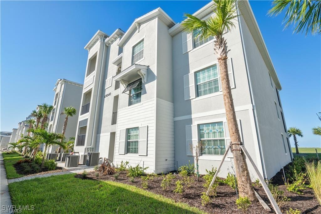 3 BR / 2 Bath ground-floor unfurnished golf optional condo with an outstanding golf/lake view. Located on the ground floor, overlooking the golf course and a small lake. Covered dedicated carport space directly in front of unit entrance. Also has many uncovered parking spaces nearby marked for guests. Rent includes Internet, trash, and water. Tenant pays for only Electric.

Open floor plan with two guest bedrooms near the foyer. The kitchen has a dining room tucked to the side and opens to the living room with access to a screened lanai. 

The unit has several upgrades - Quartz countertops, white cabinets, and tiles in the living area. Babcock National is a gated golf and country club masterplan community in Babcock Ranch, FL. Situated on a 460-acre property, Babcock National residents will call home to full amenities, including a resort-style pool and tiki bar, tennis courts, bocce ball, pickleball, fitness center, full-service spa, formal dining room, and gated entry to the community. An 18-hole, Gordon Lewis-designed golf course navigates its way through the community, providing a great test to golfers of all skill levels. Rent includes privileges such as golf membership, high-speed Internet, water, and trash. You have to come and see it to appreciate it. 

The Babcock National Amenity Center includes:
*Clubhouse
*Restaurant
*Tennis and Pickleball courts
*Resort-style pool with lap lanes & a Spa / Hot Tub
*3 Satellite Pools
*Poolside Tiki bar offering drinks & Light fare
*State-of-the-art fitness center, sauna and Day Spa
*The Clubhouse, Restaurant & Pickle Ball Courts
Access to the Babcock Ranch amenities which include: 2 pools, Gas fireplaces and grill cubicles for entertaining, tennis courts, bocce ball courts, pickleball courts, basketball courts, and various open field areas.

Along with these amenities, downtown Babcock Ranch offers you the Lakehouse Restaurant, Slaters Provisions, Coffee Shop & Ice Cream Store, the Community Security office, Miles of beautiful walking trails, and many other businesses right in the Community. Publix anchors the Crescent B Commons Shopping Center, where you'll find many other restaurants, retail shops & a Starbucks inside the community.

*(Optional) Golf One-Time Membership Fee payable directly to the HOA, (grants access to 18 holes of golf for nominal cart fee, with no greens fees).

This home can also be leased under a New Home Buyer Flex lease designed exclusively for tenants waiting for their home to be built or buying a new home.