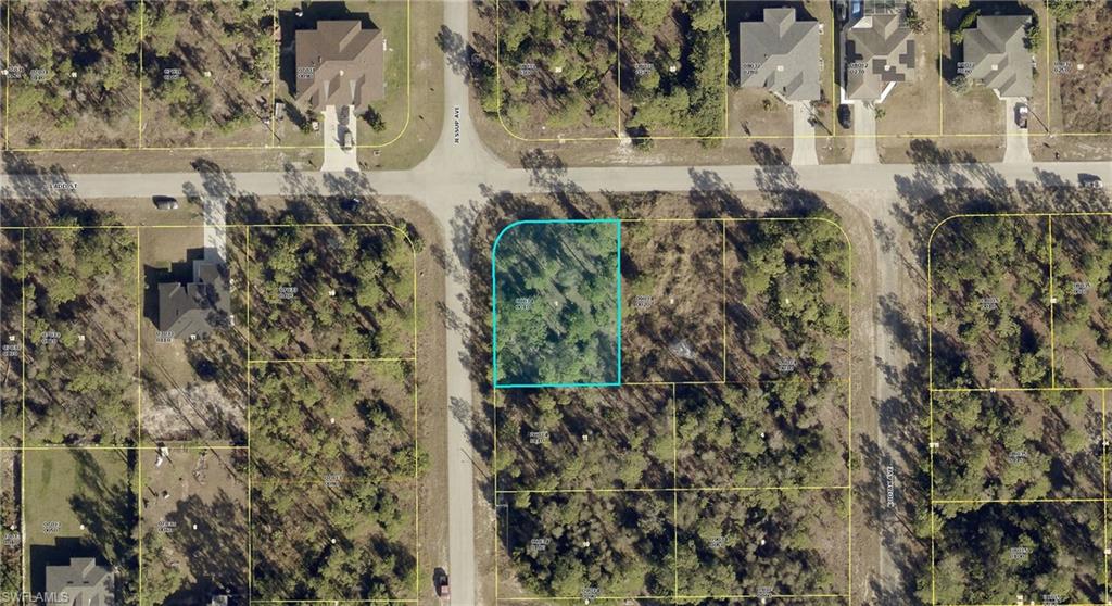 Your attractive corner lot sits in a quiet residential pocket of Lehigh Acres, offering excellent visibility, easy access, and flexible design potential. With new homes rising throughout the area, this property is perfectly positioned for your future build or investment project.

Key Property Highlights
Premium Corner Lot  
Enjoy added space, wider design options, and improved driveway placement thanks to the corner layout.

Quiet, Low-Traffic Street  
Ladd St provides a peaceful setting ideal for families, retirees, or anyone seeking a calm neighborhood feel.

Growing Residential Area  
Surrounded by new construction and well-kept homes, this location continues to gain value year after year.

Easy Access to Main Roads  
Quick routes to SR-82, Homestead Rd, and Joel Blvd keep shopping, dining, schools, and daily essentials within minutes.

High-and-Dry Homesite  
Solid ground and good drainage make this lot a strong candidate for future building.

No HOA or Restrictions  
Build on your timeline with freedom and flexibility.

Ideal for Builders or Investors  
Corner lots are always in demand — a smart addition to any portfolio.