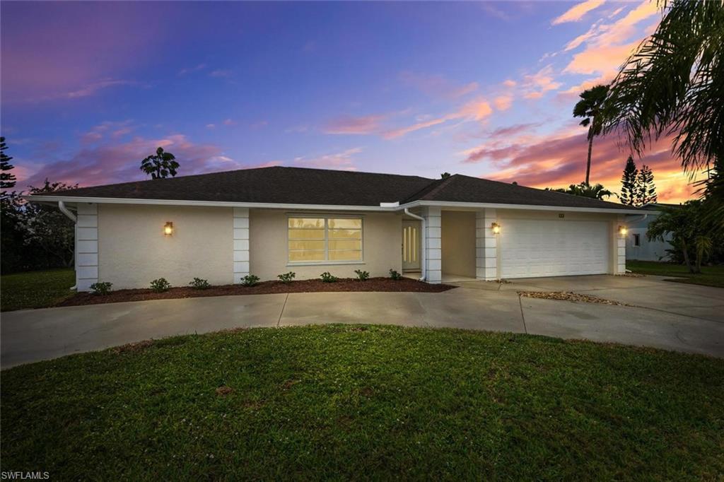 Discover your dream home in Naples, Florida! This stunning 3-bed, 2-bath gem is a true paradise. As you step inside, you'll be immediately captivated by the unique sunken living room, creating a warm and inviting atmosphere. A standout feature of this home is the open floor plan and bonus oversized family room, perfect for entertaining guests. Step outside to your private oasis – a screened pool with its own pool bath, surrounded by serene wooded surroundings. With a spacious backyard and lanai, this property is perfect for outdoor activities and gardening. The newer roof provides peace of mind, and the stainless steel appliances and granite countertops in the kitchen elevate your culinary experience. This charming residence is located in the highly desired Willoughby Acres, with the added bonus of no HOA fees or rental restrictions. Nestled in the vibrant heart of Naples, you are just minutes away from the beaches, shopping, and dining, providing effortless access to everything Naples has to offer, without the  hassle of traffic. Whether you're looking for a permanent residence or a vacation retreat, this home offers the best of Florida living!