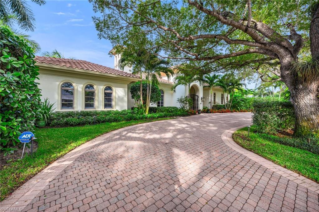 Uniquely situated on a large corner lot on mahogany tree-lined 1st Avenue North, 455 offers single-story living at its best. Located in the coveted X500 flood zone, this gracious move-in ready home featuring four bedrooms, four baths, and upgrades galore has remained high and dry. French doors throughout offer views of the bougainvillea-laden outdoor retreat. Soaring ceilings, sprawling layout, and flexible fourth suite provide comfortable multi-generational living. Updated eat-in kitchen features Dacor, SubZero and Bosch appliances. Spa-like primary bath provides an escape from the world. Lush, updated outdoor area is highlighted by a reimagined saltwater pool and spa and enclosed yard with cane toad fencing, providing space for four-legged family members to roam. Full-house natural gas generator lends peace of mind, while rear driveway assures plentiful parking, additional privacy, and alley access. Nestled in a quiet block on a lot twice the size of much of the competition, this property offers livability and potential at a fraction of the cost of newer construction. A must-see.