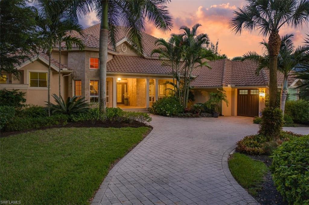 Immediate Golf Membership Available.  Set mid-block on a bucolic lane in Grey Oaks, this beautiful family home has wide open views of both the 10th and 18th fairways of the Pine course.  Totally renovated with excellent detail. At the heart of the home is a custom kitchen with Wolf and Subzero appliances, exotic stone counters and a massive island which flows into the large family room overlooking the course.  The principal suite has been rearranged to create two huge custom-fitted walk-in closets and includes a sitting area and direct pool access.  The principle bath is split into “his and hers” joined by the shower.  Glass doors lead to a quiet sunning terrace.  There are two large en suite guest bedrooms at the opposite side of the house and there are approved plans to add a large wine/entertainment room and a 4th ensuite bedroom.  Formal dining room and study flank the foyer and are generously proportioned.  There is a large covered lanai looking across a gorgeous renovated pool and spa to the fairway.  A new roof and oversized 3 car garage complete the package.  This is a wonderful home and a great opportunity to be literally steps from the main clubhouse.