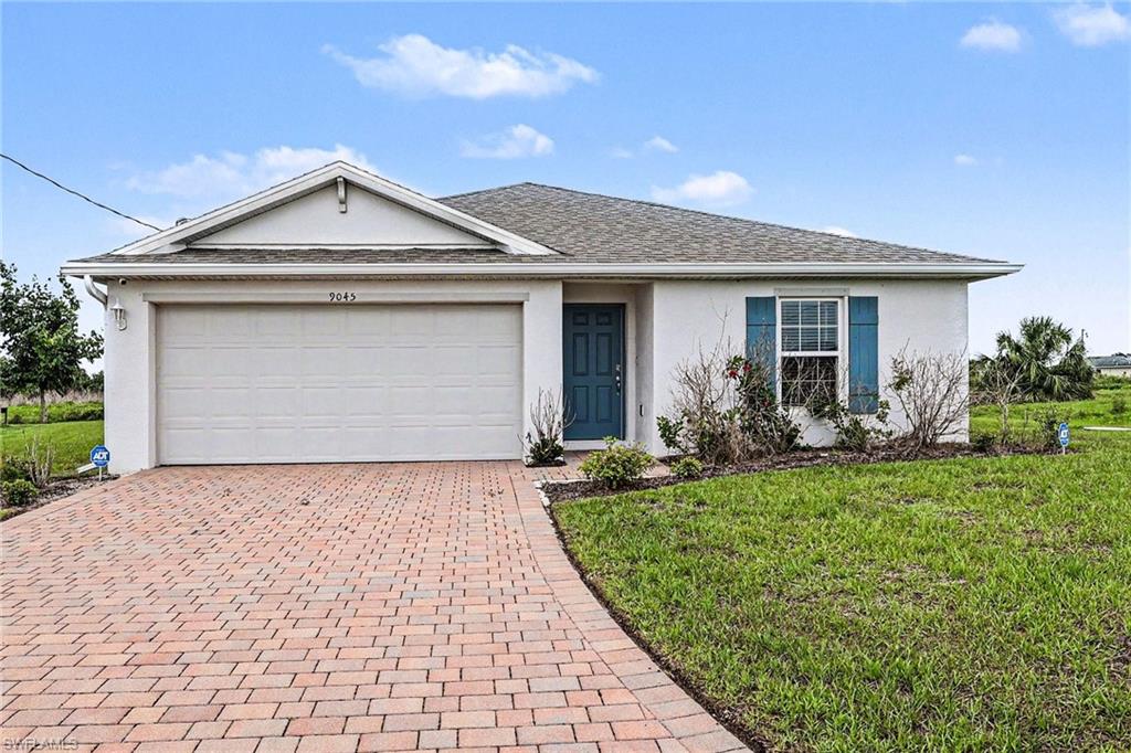 If you've been waiting for a clean, move-in ready home that still feels brand new, 9045 Maywood Circle in LaBeIle checks all the boxes. Built in 2022 by DR Horton and rarely occupied due to absentee ownership, this property offers the benefits of new construction without the wait or hassle.
Situated on a generous .26-acre homesite, this property features a standard septic system—avoiding the ongoing maintenance requirements of newer systems. Constructed with durable concrete block and topped with a shingle roof, the home offers both quality and energy efficiency. A two-car garage, paver driveway, and inviting front entry add to its curb appeal.
Inside, you'll find approximately 1,500 square feet of well-designed living space with 4 bedrooms and 2 bathrooms. The open-concept floor plan welcomes you with a spacious entry leading into a bright and airy living area that seamlessly blends the kitchen, dining, and family room—perfect for everyday living and entertaining. The split-bedroom layout provides added privacy, while the separate interior laundry area comes complete with a new washer and dryer.
Step outside to enjoy the covered rear porch overlooking a large greenbelt, offering extra privacy and a peaceful setting.
Additional features include hurricane shutters and true move-in ready condition.
Conveniently located near LaBelle Middle School with easy access to SR 80 for travel to Clewiston, or SR 29 for a quick commute to Fort Myers and Naples, this home offers both comfort and accessibility.
