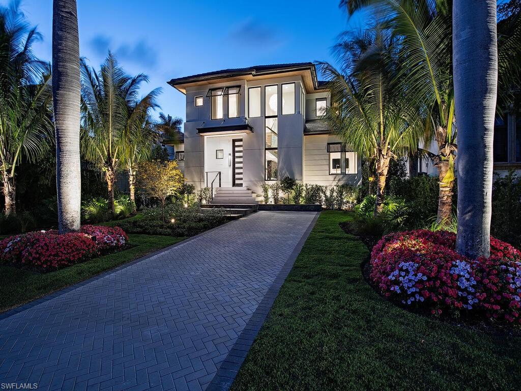 Representing a collaborative effort to push the edge of refined beauty and luxury, 461 embodies elevated sophistication - just 4 blocks from the beach and one block to the locally preferred 3rd St shopping and dining. Flawlessly designed by Jeffrey Fisher Home, penned by the celebrated firm of MHK Architecture, and built to exacting standards by Waterside Builders. Warm color tones seamlessly blend with rich materials and textures. Through the foyer a light-filled, beautifully designed study leads to open dining and a stunning backlit bar. The elegant first floor Master wing is positioned with quick access to the pool and outdoor area. The upscale designer kitchen featuring Wolf, Subzero and Miele, adjoin a spacious pantry and first floor laundry. The living room looks out toward the pool and spa, with multiple covered outdoor spaces in a secluded and serene design. Upstairs on the second level privacy and amenities are paramount. 3 en suite bedrooms, an additional laundry room, spacious bonus room, and a VIP 2nd floor bedroom suite with exterior accessibility. Control 4 home automation and in addition to a home generator ensure comfort and convenience. A truly bespoke offering positioned in the most sought after section of Old Naples.