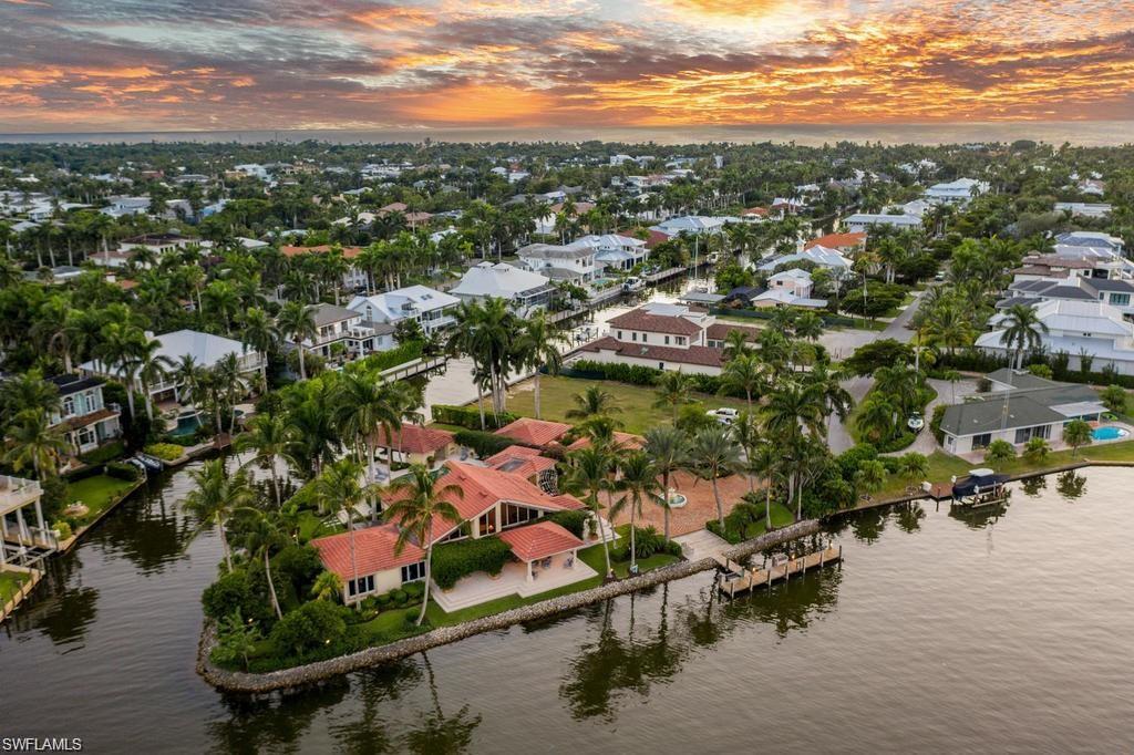 Build Your Dream Home!! This is a Rare Opportunity to own over 28,000 sq. ft of one of Naples, Florida’s most Coveted Waterfront Properties and it's Spectacular Views. Unique Boaters Dream…450 Feet of Direct Gulf Access Waterfront Overlooking Tranquil Crayton Cove to the Clubhouse and Marina of the Naples Yacht Club, as well as an Expansive View of Naples Bay!!. You’ll Love the Location in Olde Naples Closest "Bay to Beach" Neighborhood, Aqualane Shores. Just 1 1/2 blocks to the Iconic Third Street Shoppes and Restaurants and a Short Stroll to the Beach!!