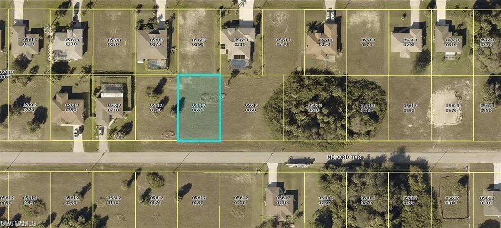 Priced accordingly to reflect the possible presence of two gopher tortoises on the property. A $10,000 adjustment from estimated market value has been considered to assist with potential relocation costs. Seize the opportunity to own a residential lot in a rapidly growing area of Cape Coral WITH NO UTILITIES ASSESSMENT PLANS.  Surrounded by newer construction and well-maintained properties. Located in a quiet residential neighborhood, the lot offers ample space for a variety of home designs, outdoor living areas, and a pool. With no timeframe to build, you have the flexibility to develop now or hold for future value. Conveniently positioned near schools, parks, shopping, dining, and major roadways, this location provides easy access to Fort Myers, Punta Gorda, and Southwest Florida’s world-famous beaches. Whether you’re planning your dream home or adding to your investment portfolio, this lot offers space, location, and long-term potential in one of Cape Coral’s most promising areas.