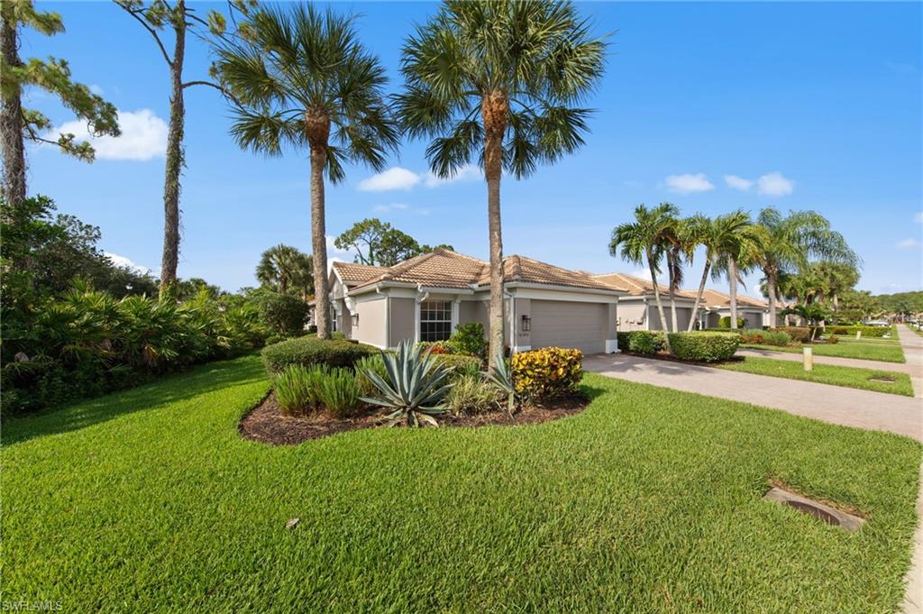 WELCOME to prestigious Colonial Country Club! This gorgeous TURNKEY home offers an exceptional blend of comfort, elegance, and resort-style living.  Situated on a premium corner lot with abundant landscaping is just steps away from one of Colonial's club pools! Just like having your own without the cost of a private pool!  Featuring 2 bedrooms, with a den that has the flex to be a bedroom, media, or hobby room and 2 full baths, this residence is ideally situated on a premium corner lot with abundant landscaping and is just steps away from one of Colonial's club pools! Just like having your own without the cost of a private pool!  Just steps away from the pickle ball courts—you'll find yourself in the heart of it all in Colonial Country Club. Upon entry, you’re welcomed by light-filled interiors, warm deluxe vinyl tile flooring, and all designed for effortless Florida living. The well appointed kitchen is both functional and luxurious showcasing black and stainless-steel appliances, pantry, and a layout that opens seamlessly to the dining area and spacious great room and lanai, making it perfect for entertaining or everyday relaxation. The Primary Suite is spacious and comfortable and views the landscaped back yard and serves as a peaceful retreat, featuring an en-suite bath with white cabinets, walk-in shower, dual vanity basins, tile flooring and a spacious walk-in closet. Enjoy tranquil views tropical landscape from your retreat. The guest room is comfortable with an enchanting window seat. A pocket slider door makes this guest room with full bath completely private for your guests. Step outside to your tropical lanai overlooking the lush landscape which will provide year-round enjoyment. There is room for a private pool/spa or extended lanai. Newer roof and all new exterior paint.  Dedicated laundry with tub and wood cabinets. 2-car garage. Residents enjoy 24/7 guard-gated security and impressive amenities, including the newly renovated 18-hole championship golf course ( this home is on a pay-as-you-play basis), resort-style pools (two being club pools), tennis, pickleball, bocce and a state-of-the-art fitness center with aerobics, water aerobics, and more. The community is known for its vibrant social scene, pickleball, tennis and bocce tournaments, and private club membership offering formal dining and the Sunset Grille with indoor and outdoor dining. Colonial Country Club has earned the prestigious Distinguished Club Award, ranking it among the top 4% of clubs worldwide, and is also recognized as one of America’s Healthiest Clubs. Conveniently located near RSW Airport, I-75, shopping, dining, medical facilities, and just minutes from Southwest Florida’s world-class beaches and ball stadiums, this home offers the ultimate resort lifestyle. Come see it, fall in love, and start living the lifestyle, where every day feels like a vacation.