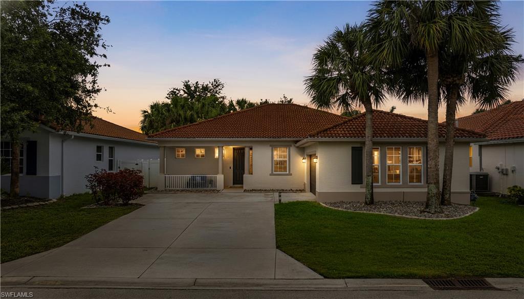 PRIDE OF OWNERSHIP shines throughout this CHARMING residence nestled on a PRIVATE INTERIOR homesite in one of Gateway's most desirable neighborhoods. Built by renowned WCI Communities, known for superior construction and thoughtful design, this beautifully maintained home offers peace of mind with NEW FLOORING, fresh paint, and a FULLY FENCED backyard perfect for pets, play, and entertaining. A convenient SIDE-LOAD GARAGE enhances the home's curb appeal and functionality.

Recent improvements include a NEW WATER HEATER (2024), NEW HVAC SYSTEM (2024), FRESH EXTERIOR PAINT (2025), and UPDATED LANDSCAPING (2025) featuring decorative pavers and rock accents for low-maintenance Florida living.

To make your purchase even easier, the seller is providing added peace of mind with a completed 4-POINT INSPECTION and WIND MITIGATION REPORT for the buyer.

Located in Gateway's ONLY NATURAL GAS community, residents enjoy LOW HOA DUES, COUNTY-ONLY TAXES, and the confidence of being HIGH AND DRY in Flood Zone E with NO FLOOD INSURANCE REQUIRED. WCI builders are known for quality construction, timeless architecture, and thoughtfully designed floor plans.

GOLF CART FRIENDLY and PET FRIENDLY, Gateway offers an unmatched lifestyle with tree-lined streets and mature canopies perfect for evening strolls and neighborhood rides. Cruise over to local favorites including The Tavern, Skinny Dogz, Saucy's Pizza, farmers markets, and Fort Myers Brewing Company, where live music, food trucks, and gathering with neighbors have become a way of life.

Just minutes away, The Club at Gateway offers flexible and optional memberships for championship golf, tennis, pickleball, fitness, dining, and vibrant social activities without mandatory country club fees. Conveniently located near RSW International Airport, JetBlue Park, shopping, dining, and top-rated schools, Gateway remains one of Southwest Florida's premier master-planned communities.

Come discover why so many are proud to call Gateway home. Ask about the Summer Preview Membership at The Club at Gateway and available buyer incentives, and experience firsthand the resort-style lifestyle that makes Gateway one of Southwest Florida's best-kept secrets.