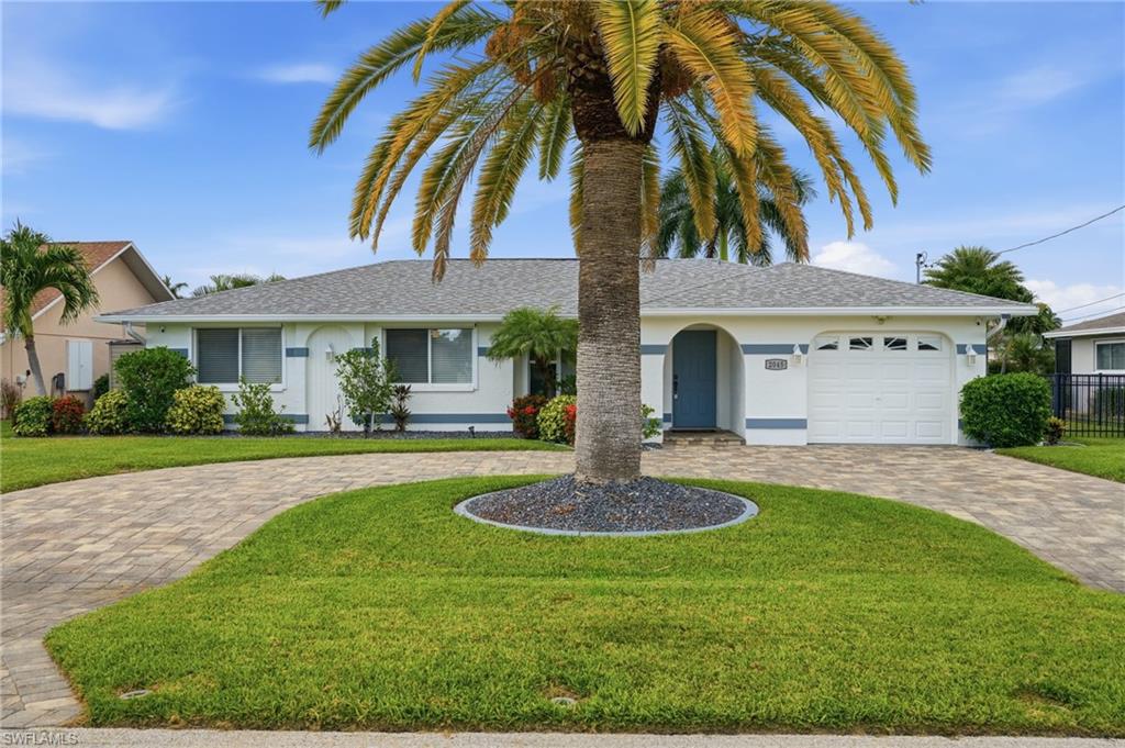 Welcome to the Florida waterfront lifestyle you've been dreaming of! Boaters and fishermen will immediately appreciate this exceptional direct Gulf access location offering no bridges and just minutes to open water. Whether you're heading out for a day on the boat, chasing the sunset, or enjoying some of Southwest Florida's best fishing, this location simply cannot be beat.

Beautifully remodeled throughout, this 3-bedroom, 2-bath home offers over 1,500 square feet of thoughtfully designed living space, combining modern coastal style with functional living areas perfect for both everyday living and entertaining. The stunning quartz island kitchen serves as the heart of the home and features abundant soft-close cabinetry and drawers, pull-out pantry shelving, sleek stainless steel appliances, tiled backsplash, pendant lighting, and recessed lighting. Storage is plentiful and every detail has been thoughtfully updated.

Inside, you'll find a spacious and versatile floor plan offering both a living room and family room, along with a generously sized dining area. The family room showcases a wall of sliding glass doors that open to the screened lanai, creating a seamless indoor-outdoor living experience. Modern finishes, updated flooring, and tasteful upgrades continue throughout the home. Both bathrooms have been beautifully renovated with solid surface vanities and contemporary finishes.

The primary suite offers a private retreat with an updated en-suite bath featuring a tiled walk-in shower and charming French doors that provide direct access to the pool and lanai.

Step outside and discover what truly sets this property apart. The expansive outdoor living spaces were designed to maximize Florida living. Enjoy the screened in-ground pool, spacious brick paver lanai, and an incredible 20x20 screened and roofed patio complete with vaulted ceilings and a mounted television—perfect for entertaining family and friends or simply relaxing while overlooking the water. The backyard offers a composite dock, covered boat lift installed in 2019, and a brand-new boat lift cover that is included and ready for installation.

Additional features include a fenced yard, storage shed with shelving, attached one-car garage, and paver circular driveway providing ample parking for guests. For added peace of mind, this home has never flooded during any storm event.

Conveniently located near shopping, dining, entertainment, and all that Southwest Florida has to offer, this move-in-ready waterfront gem delivers the complete package of location, lifestyle, and value.