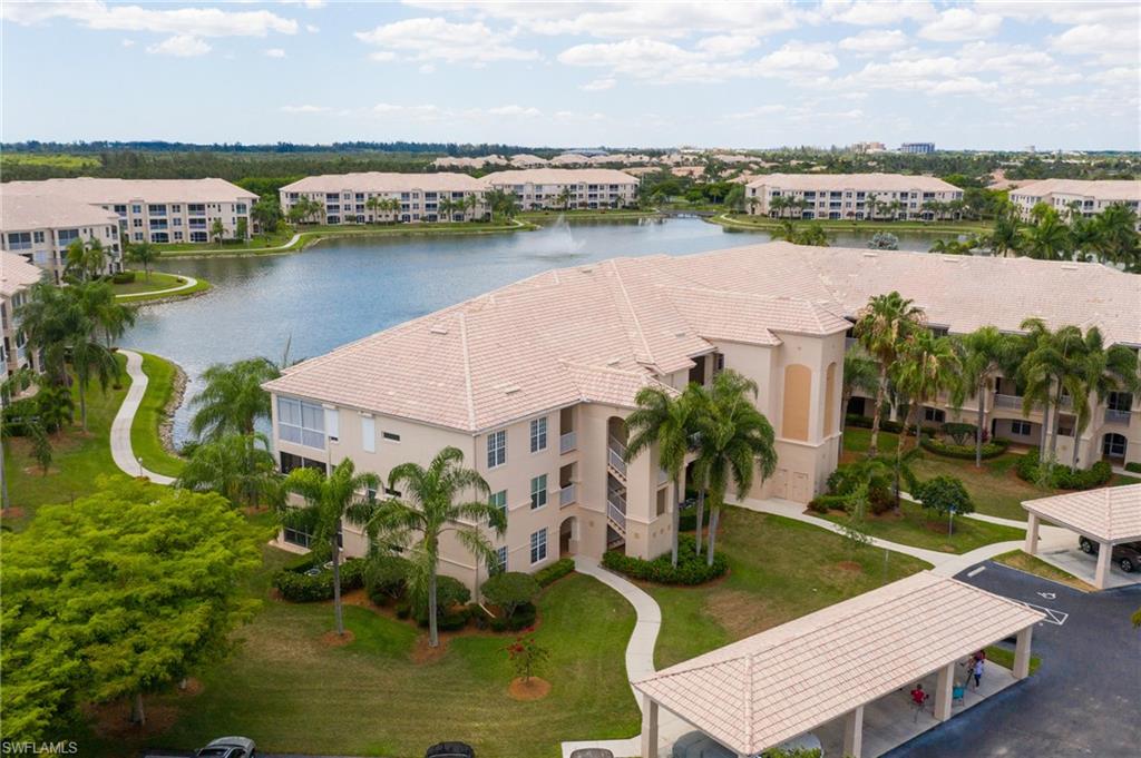 STUNNING!...is the best way to describe this 3 bedroom, 2 bath “Amelia” floor plan condo located in Lexington’s Lake Village. This light and bright first floor end unit has been totally updated with designer touches. Some of the many updates include fresh paint, laminate and tile flooring, light fixtures and newer AC. The chef’s kitchen has granite countertops, travertine backsplash and stainless steel appliances. Master and guest baths feature neutral granite countertops, updated fixtures and lights. The master bath also has been updated with a seamless glass shower door with tiled backsplash and new plush carpeting in the master bedroom. The spacious lanai has acrylic sliding windows for year round enjoyment and no see um screens. Lexington Country Club is the premier community in the heart of south Fort Myers. Stay active with numerous pools, tiki bar/restaurant, clubhouse, fitness center, tennis courts, bocce, aqua driving range, pay as you play golf and so much more! Close to sugar white sand beaches, restaurants, shopping, healthcare, B.B. Mann Performing Arts Hall and RSW International Airport. Call for your private tour before this spectacular home gets away!