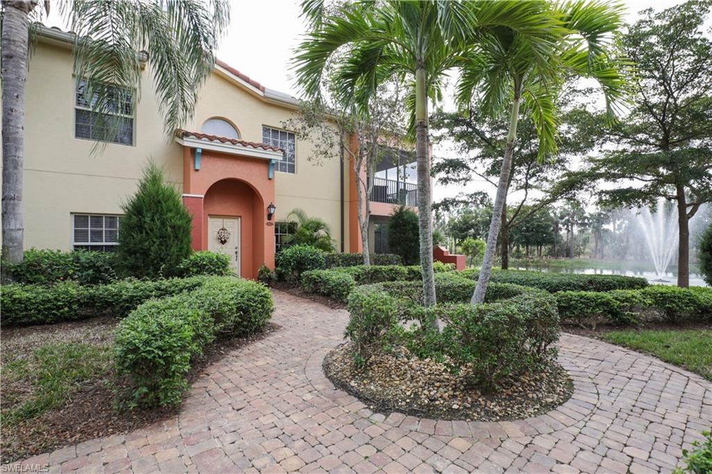 This beautifully light and spacious ground level end unit offers a 3-bedroom 2 baths floor plan has 1,706 sq. feet featuring an ample view of the lake, fountain and preserve area.  You’ll enjoy a large kitchen, long breakfast bar, attached dining area looking out to the bright living room.  This unit has 2 guest rooms, laundry room and an attached garage.   The lanai and master bedroom with a southern view out to the lake and preserve, features two closets and master bath. The Enclave At Rapallo is a private, upscale and active community with your own pool and clubhouse.  The adjoining Club at the Rapallo is a leisurely walk or bike ride down the boardwalk path through a nature preserve and around a lake.  The feature rich amenity list includes multiple world class resort pools and spa, lighted har tru tennis courts with a full-time tennis pro, stadium seating, bocce ball, a fitness center with a fitness director offering personal training and classes.  Here you’ll find an art studio, library, fishing piers, bike paths and more. Rapallo is conveniently located to Coconut Point Mall, Southwest Florida Airport along with superb dining, shopping and beautiful beaches waiting for you.