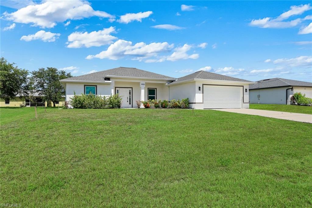 Nueva y hermosa casa de 4 habitaciones y 3 baños, construida en bloques de hormigón, en la codiciada zona noreste de Cape Coral, en Gator Circle que tiene un parque communidad con senderos para caminar, parque infantil, baloncesto, tenis y pickleball. El vendedor está dispuesto a contribuir a los gastos de cierre del comprador. Vea el recorrido virtual. ¡NO SE ENCUENTRA EN ZONA INUNDABLE! Este popular modelo Verona incluye una amplia y luminosa sala de estar de concepto abierto con pisos de baldosas, techos altos y puertas corredizas de 3 paneles que permiten la entrada de abundante luz natural y ofrecen vistas al jardin. La luminosa cocina de chef cuenta con una enorme isla, gabinetes modernos con cierre suave, encimeras de cuarzo y un acogedor rincón para desayunar. La espaciosa habitación principal tiene un luminoso baño privado con encimeras de cuarzo, lavabos dobles, una ducha de azulejos con puerta de vidrio, y vestidor walk-in. Una segunda habitación principal opcional cuenta con un baño moderno y luminoso y acceso directo a la espaciosa terraza. Dos dormitorios adicionales y un tercer baño ofrecen mucho espacio para niños, invitados, una sala de estar, un espacio flexible o una oficina en casa. En un vecindario IDEAL PARA FAMILIAS, con fácil acceso a áreas para ir de compras, comer, divertirse y a poca distancia en auto de las famosas playas de arena blanca de Florida. ¡Programe su visita hoy mismo! ~~~~~~~ Brand new, beautiful 4 bedroom/3 bath concrete block home in desirable NE Cape Coral, in the Gator Circle neighborhood with a community park with walking trails, playground, and basketball, tennis and pickleball courts. NO FLOOD ZONE! This popular Verona model features a large and bright open-concept living space with tile floors throughout, soaring cathedral ceiling and 3-panel sliding doors for natural light and views to the rear yard. The bright chef's kitchen features a huge island, modern cabinetry, Quartz countertops, stainless steel appliances, and relaxing breakfast nook. The large owner's bedroom has a bright ensuite bath with Quartz counter tops, dual sinks, a tiled step-in shower with glass enclosure, and walk-in closet. An optional SECOND OWNER'S SUITE has a bright, modern bathroom and direct access to the spacious lanai. Two more bedrooms and a third bathroom provide lots of room for kids, guests, a den, a flex space or a home office. In a family-friendly neighborhood with convenient access to areas for shopping, dining, entertainment, and Florida's famous white-sand beaches. Schedule your showing today!