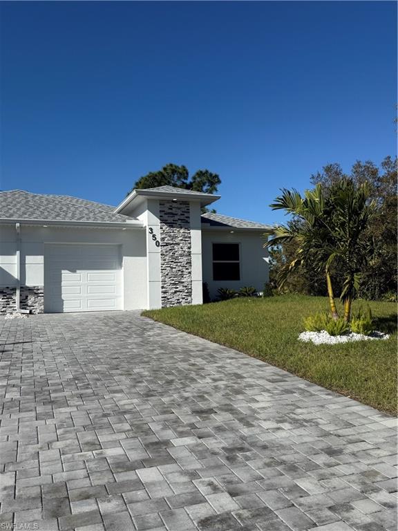 Beautiful newer construction duplex available for rent in a convenient Lehigh Acres location. This 3-bedroom, 2-bath home features an open floor plan, modern finishes, stainless steel appliances, spacious bedrooms, and an attached garage. Enjoy a bright and functional layout with plenty of storage and living space. Conveniently located near schools, shopping, restaurants, and major roadways. Move-in ready and available for immediate occupancy.