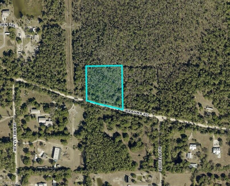 Don't miss this rare opportunity to own 2.73 acres in this hidden location for acreage in the middle of Fort Myers. This spacious parcel offers road access and ample room to bring your vision to life, whether you're looking to build a custom home, establish a hobby farm, create a private retreat, or simply enjoy extra space for recreational vehicles, equipment, and outdoor activities. The property's unique irregular shape provides flexibility for a variety of site layouts and development possibilities. Ideally located just minutes from the highway, this acreage offers convenient access for commuters, truckers, farmers, and anyone who values connectivity to major transportation routes. Its close proximity to commercial amenities adds to the property's appeal while still providing the privacy and open space that acreage living offers. Opportunities to own a parcel of this size in such a prime and accessible location are increasingly rare—secure your piece of land and start planning for the future today.