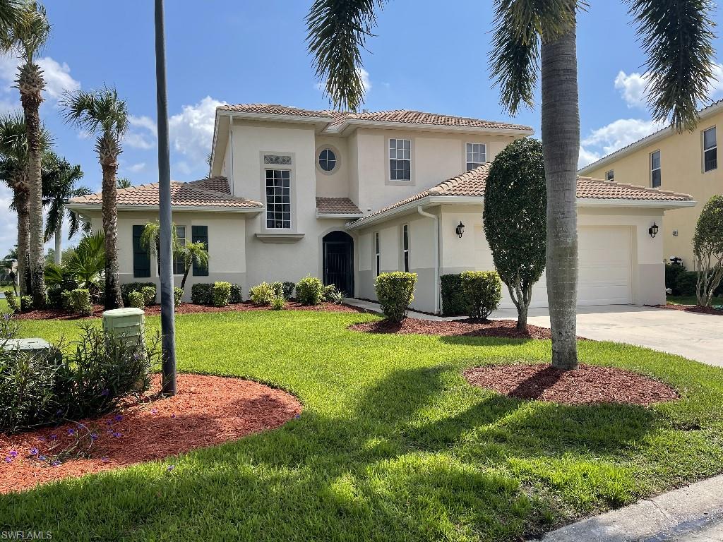 Gorgeous 2 story house newly painted with 4 bed/3.5 ba/2 car garage, 3181 sq, ft. of living area & Lanai. 10 ft ceilings: 1st floor; 9ft ceilings: 2nd floor; New tile roof at a cost of $77K plus installed in December 2018 and in excellent condition. Main living and dining areas overlook the landscaped yard and lake view. Kitchen and Master Bath are up-graded with new countertops, new sinks. Large master bedroom and open living room contain crown molding. Main A/C unit is under 8 year remaining parts and labor warranty with Unique Air Condition service provider. Upstairs A/C unit, installed in 2013. bptj units serviced in 2021 (coils cleaned with UV lights). natural gas fireplace (2-way view), gas waterheater installed in 2020 with 5 year remaining warrarty, gas stove and gas dryer. Kitchen has white appliances with plenty of cabinets and walk in pantry. A breakfast bar opens to a large family room. The master bedroom is downstairs and has a sitting room. The adjoining master bath has double sinks, closed in toilet, separate shower and garden tub as well as a custom walk in closet. Upstairs there is a large media room, 3 lg bedrooms off an open hallway and 2 full ba.
