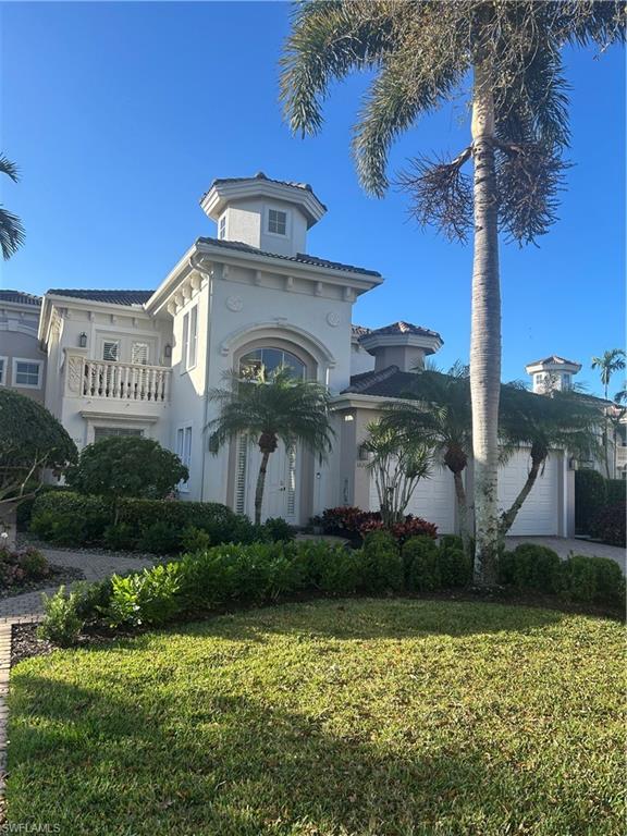Avellino Isles is a private, gated community within the Vineyards Development. Located on the quiet inner circle, 505 Avellino, Unit 38202 presents with 4,460 total square feet including 3,282 under air; making the Raphael floor plan the largest residence in Avellino Isles. The entrance to this second floor residence has a towering cupola and private elevator. The tall ceilings, generous room dimensions and expansive hallways give the impression of a single family home. In addition to the two garages, the large driveway easily accommodates four vehicles making it ideal for family, visitors and entertaining guests.This 3 bedroom/4bath+den residence comes complete with motorized storm shutters, custom wood plantation shutters, upgraded lighting package, surround sound, new appliances, sinks, plumbing fixtures, hot water tank, quartz countertops in baths and epoxy garage floor. Both HVAC systems were replaced and upgraded in 2018. In 2025, the development completed major renovations with new tile roofs, gutters, downspouts, carriage and coach lights and entrance gates along with complete new exterior paint palette and landscape refresh. Avellino Isles is an active lifestyle community and features a massive infinity pool, spa and outdoor dining areas with grills. The remodeled clubhouse includes a complete kitchen, library, card/meeting room, fitness center, sauna and a great room for neighborhood events. The recently updated Vineyards Country Club is nearby and boasts two new championship golf courses, tennis, pickleball, bocce, and a world class wellness center with pool and full service spa, along with dining and social events. Living in Avellino Isles provides a central location affording access to all that Naples and the Southwest Florida lifestyle has to offer.