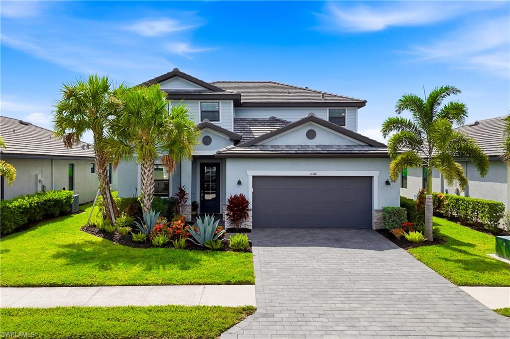 Don’t miss this rare opportunity to own one of Timber Creek’s most desirable locations—just steps from the Clubhouse and Town Center! This highly sought-after Amalfi floor plan offers exceptional space and flexibility with 4 true bedrooms, an expansive bonus loft, and a formal dining room that can easily serve as a home office or den. From the moment you arrive, you’ll appreciate the home’s inviting curb appeal, highlighted by lush, mature landscaping. Inside, the home is beautifully appointed with designer lighting and fixtures, plank tile flooring, granite countertops, and timeless white shaker cabinetry. Step outside to your private backyard retreat featuring a sparkling pool with elegant laminar water features. The Clusia privacy hedge can be maintained for complete seclusion or trimmed to maximize the breathtaking lake views and spectacular sunrise mornings. Living in Timber Creek feels like being on vacation every day. The award-winning amenity center features a full-service restaurant, bar & grill, resort-style pools, and a dedicated lifestyle director who keeps the community active with a year-round calendar of social events and activities. Additional amenities include: Two fitness centers, Saunas and locker rooms, Full-size indoor basketball and volleyball court, Pickleball and tennis courts, Arcade, Social hall, Playground, Splash pad, Putting green, Event lawn, Two bocce courts, Sand volleyball court, Fire pit and more! Conveniently located with quick access to I-75, Southwest Florida International Airport, JetBlue Park, Downtown Fort Myers, and the shopping, dining, and everyday conveniences along the Daniels Parkway and Colonial Boulevard corridors, this home offers the perfect combination of luxury, location, and lifestyle.