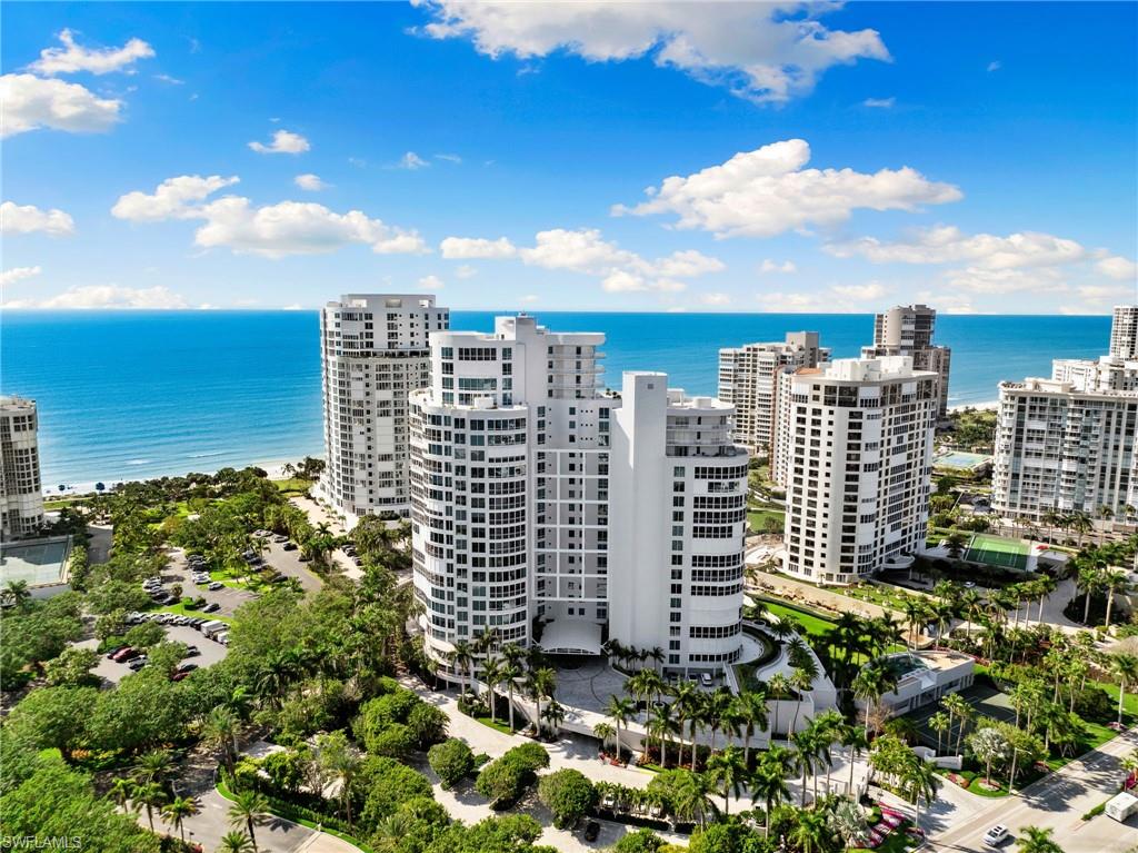 Perched on the 17th floor, this stunning residence at The Provence offers breathtaking Gulf views. Spanning 3,952 sq. ft., this luxurious property features an expanded floor plan with two spacious screened terraces and water views from every room. Elegantly remodeled, the residence boasts high-end upgrades, soaring 10 ft ceilings and floor-to-ceiling windows that frame the sparkling Gulf of Mexico and bay vistas. The chef's kitchen is a dream, outfitted with custom cabinetry, premium stainless steel appliances, a wine storage unit, an oversized farmhouse sink, a center island, and a breakfast bar. Each bedroom is designed with upgraded wood flooring, en-suite bathrooms, and walk-in closets. Additional highlights include two designated under-building garage spaces, an electric vehicle charging station, and a large storage locker. The Provence defines luxury living, with amenities such as a stunning pool, spa, outdoor kitchen area, guest suites, fitness center, tennis courts, sauna, 24-hour security, and on-site management. Residents also have access to boat docks at the Venetian Bay Yacht Club, private beach access, and the Park Shore Promenade—a scenic 1.3-mile path along the beach. Located across the street from the dining and shopping of Venetian Village and close to Waterside Shops and downtown Naples, this beachfront high-rise offers the perfect balance of sophistication and the Southwest Florida lifestyle.